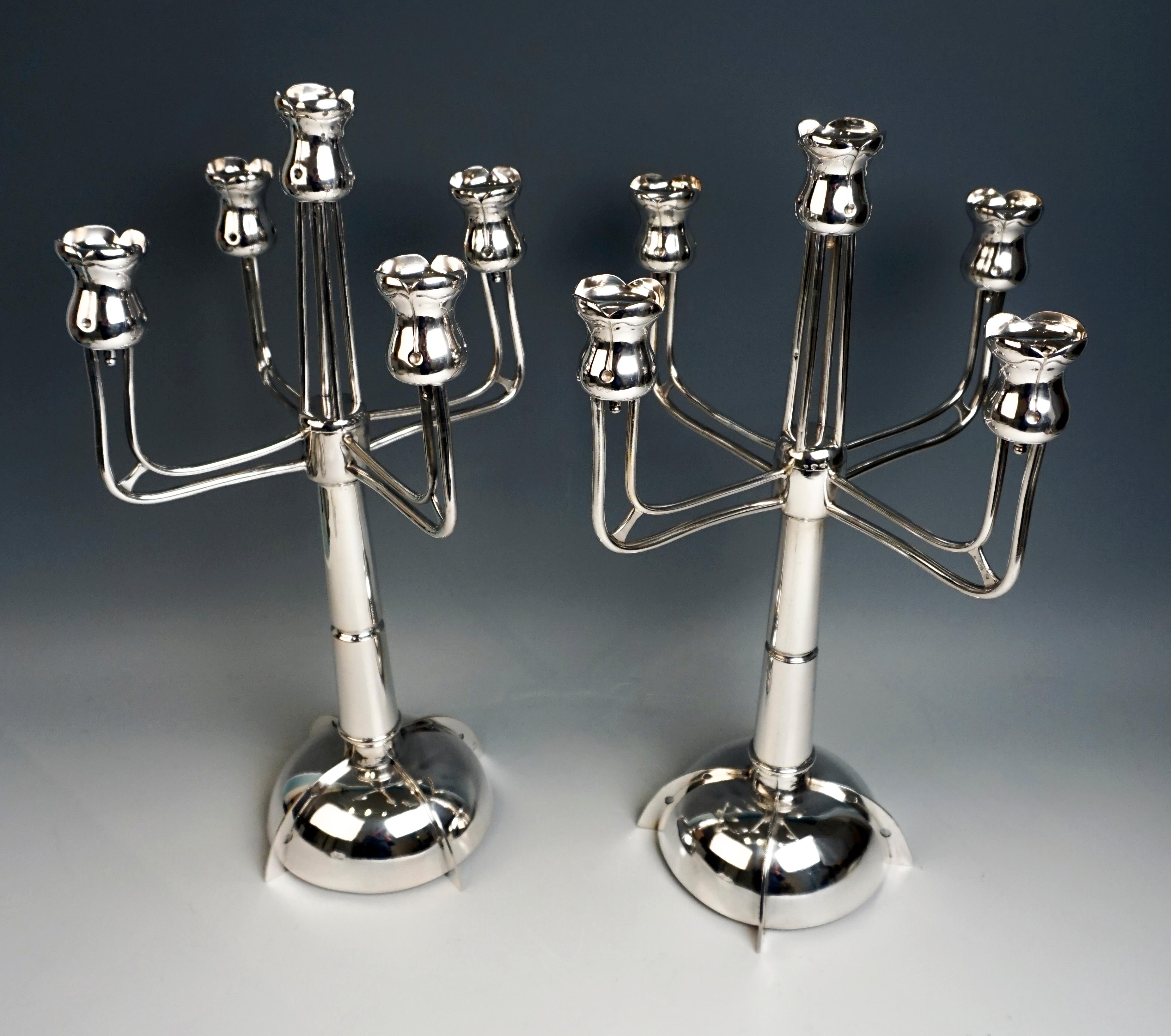 Two extraordinary five-light candelabra from the time of the Vienna Secession

Made circa 1910
Branded by the Viennese official hallmark 1872-1922 / Diana's head and different Austro-Hungarian Hallmarks
Master's mark: 'EK' for Emil