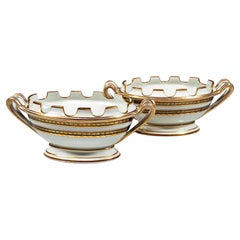 Pareja de enfriadores imperiales vieneses de porcelana, cobalto y oro, fechados en 1811