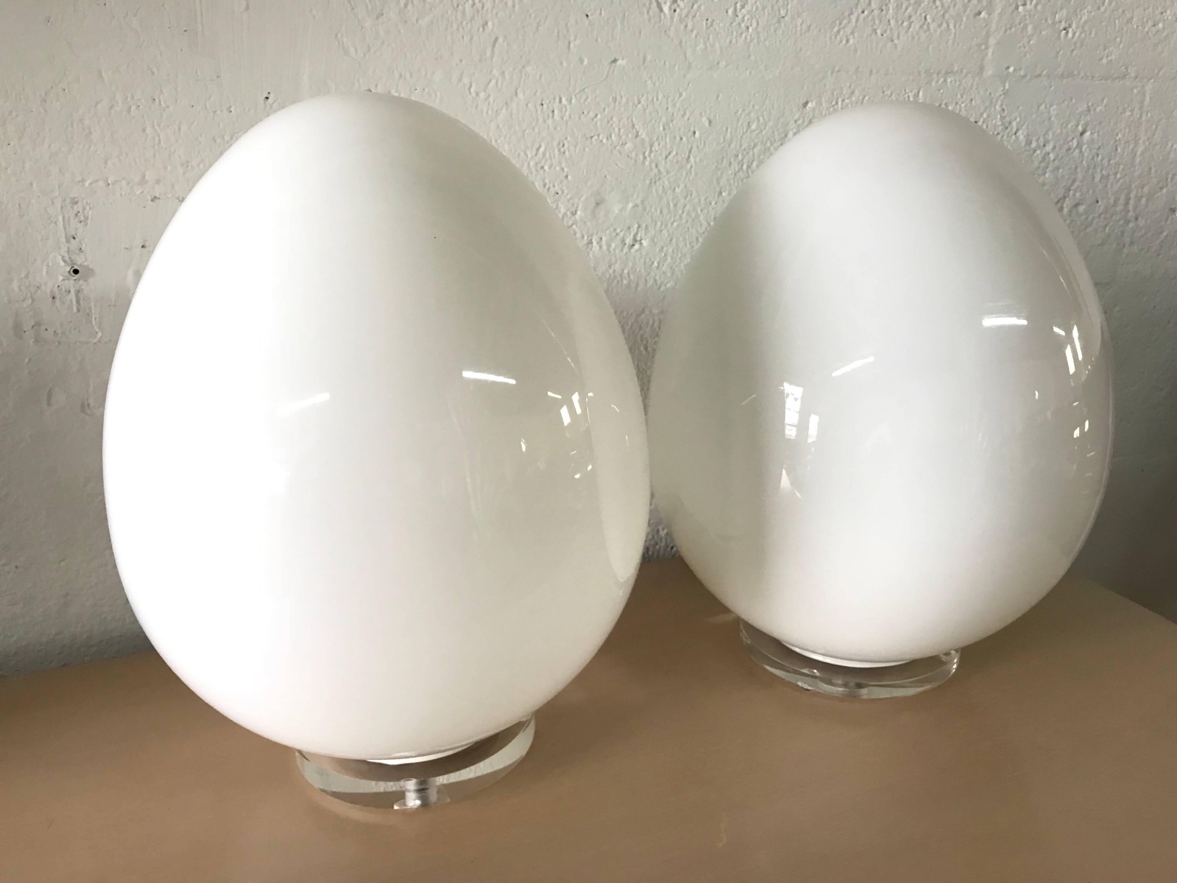 Murano glass egg lamps by Vietri with Lucite bases and two-light settings.