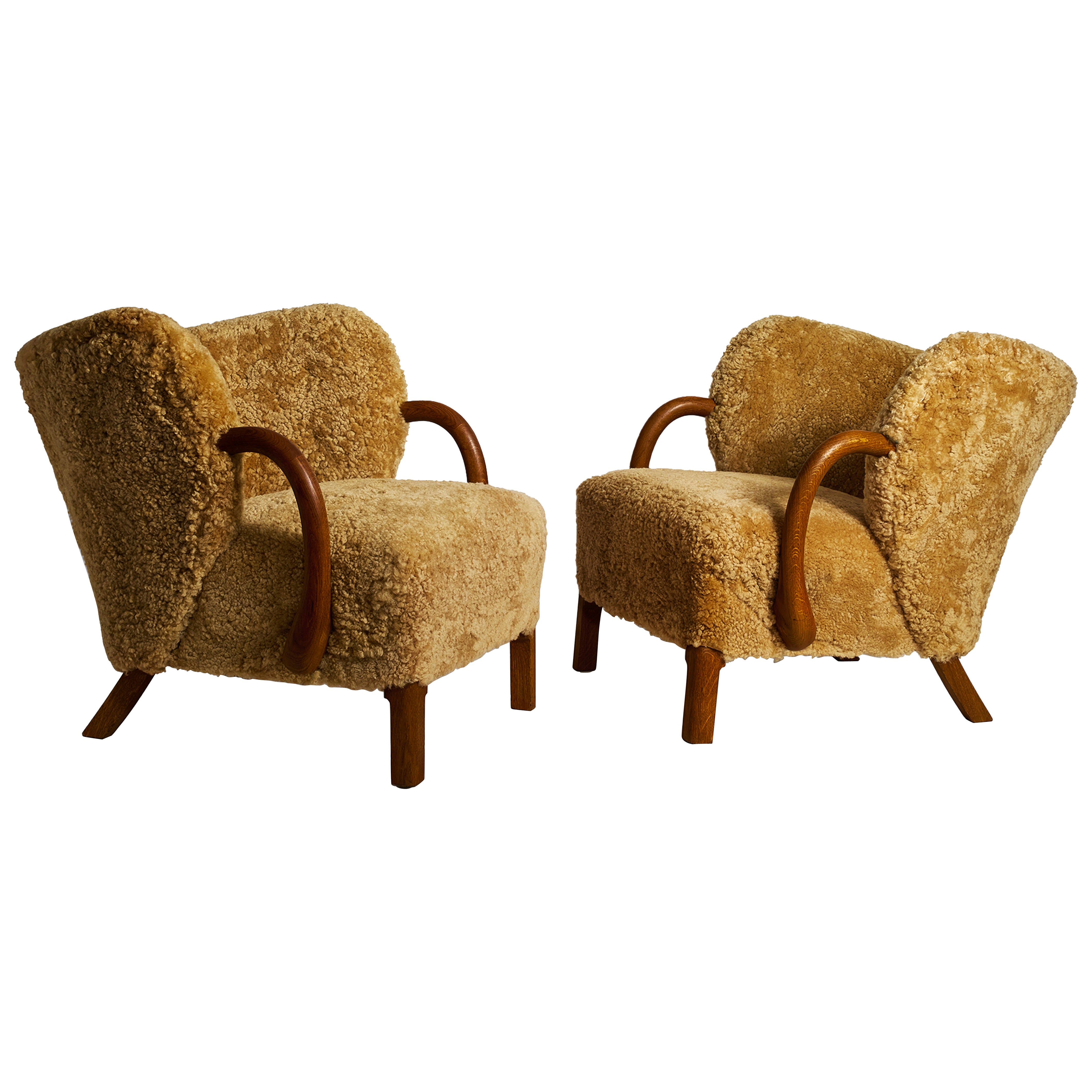 Pair of Viggo Boesen Attributed Scandinavian Lounge Chairs in Oak and Sheepskin