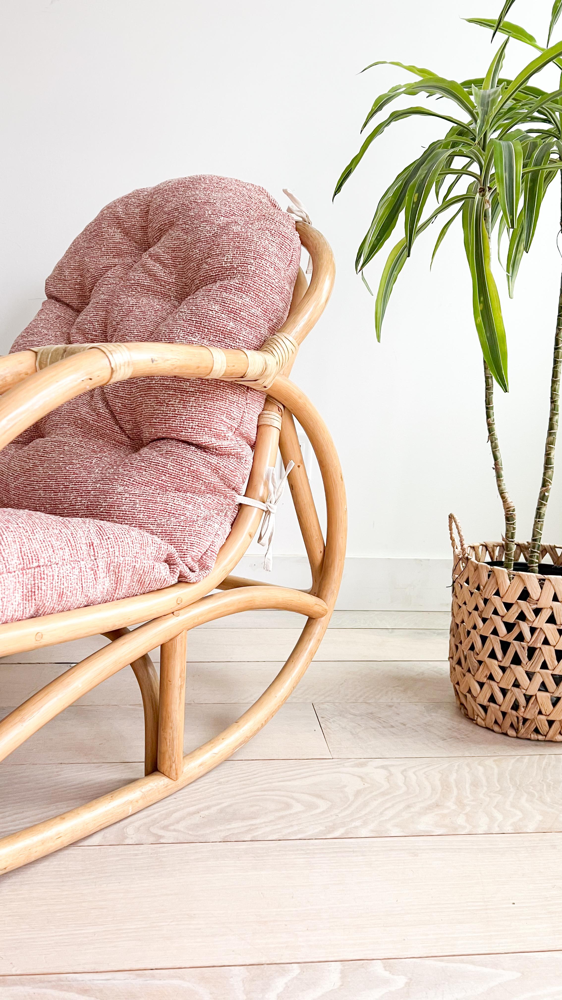 Enhance your space with the timeless appeal of these delightful rattan rocking chairs, inspired by the iconic designs of Viggo Boesen. Featuring fresh pink and white upholstery, these chairs exude warmth and style, perfect for adding a cozy accent