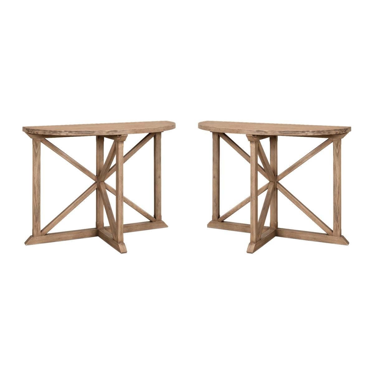 The Vineyard demilune console table is a stunning piece that brings a touch of nature into your home. Made from pine, it has a natural and rustic look that will instantly warm up any space. The flaky pine finish gives it a one-of-a-kind texture and