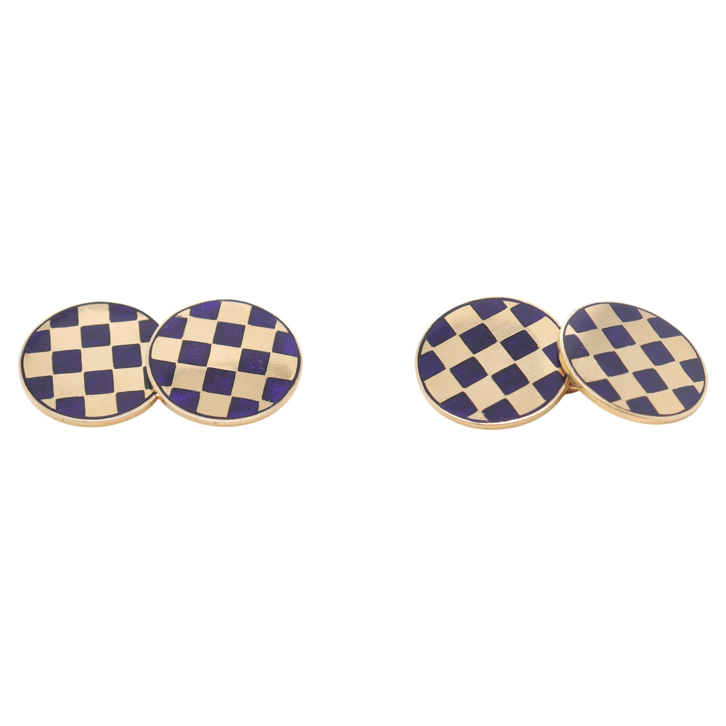 A fine pair of vintage cufflinks.

In 14 karat yellow gold with a blue enameled checkerboard pattern.

Connected with oval links.

Simply a wonderful pair of cufflinks for the well-dressed man!

Date:
20th Century

Overall Condition:
They are in