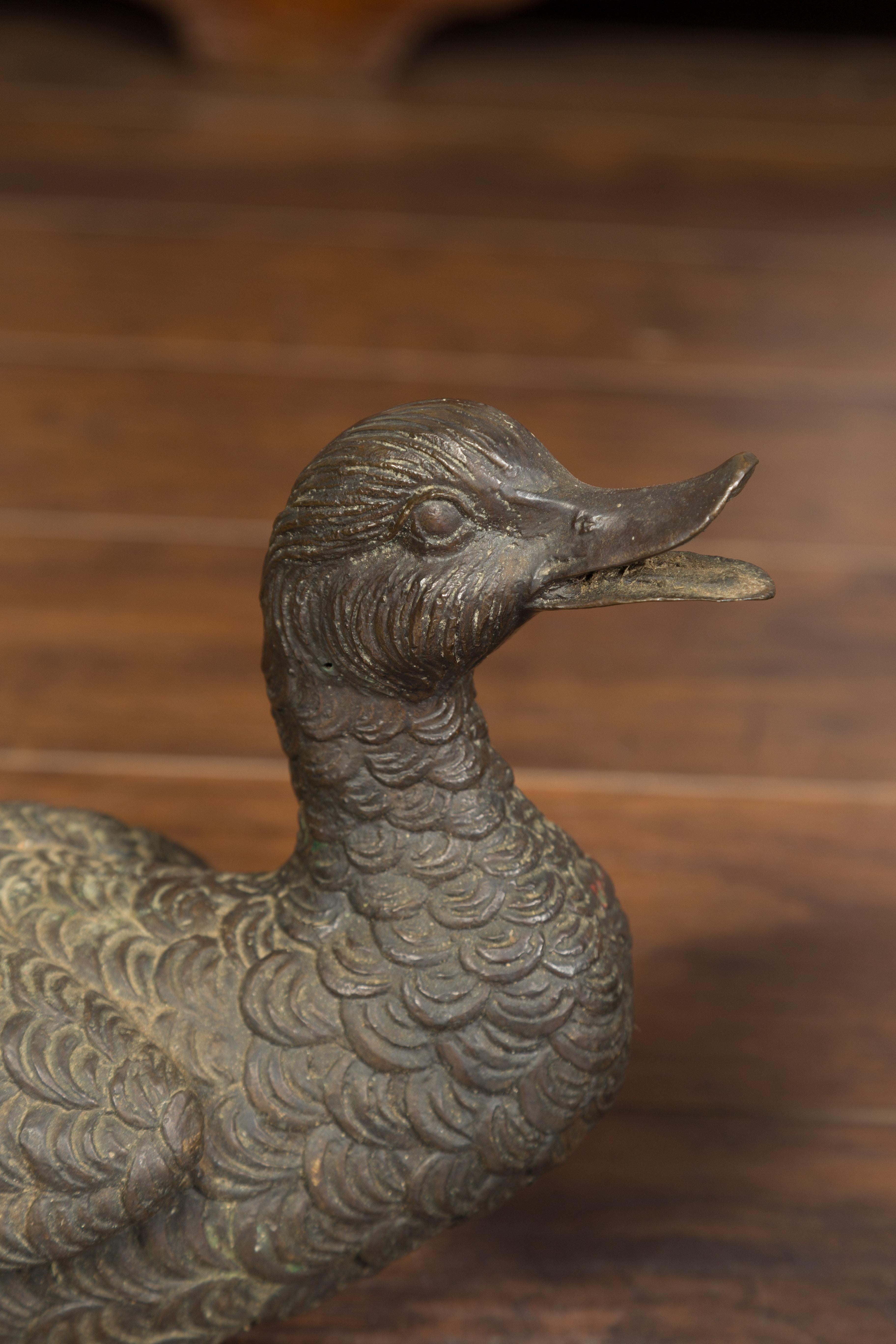 20th Century Pair of Vintage 1940s Bronze Swimming and Quacking Ducks For Sale