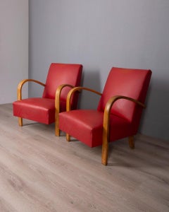 Pair of vintage 1950s armchairs in red leather, Italian design