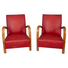 Pair of vintage 1950s armchairs in red leather, Italian design