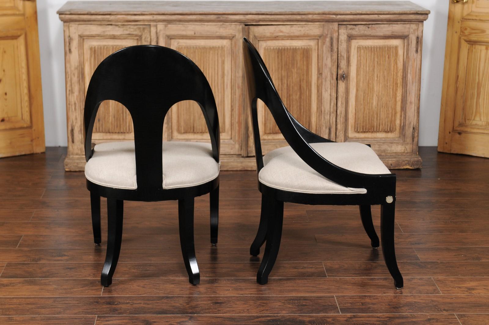 20th Century Pair of Vintage 1950s Ebonized Wood Spoon Back Chairs with Mother-of-pearl Inlay
