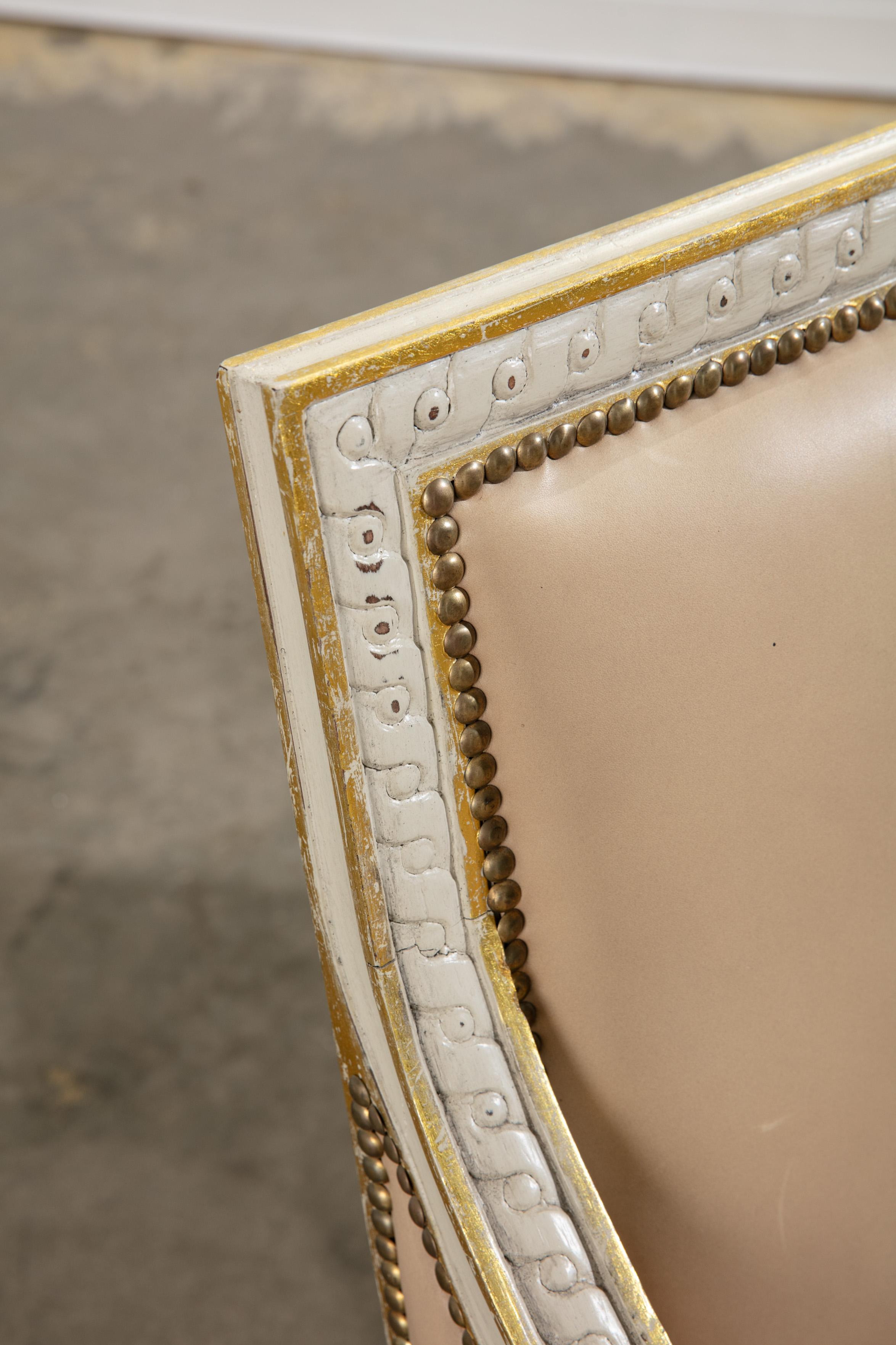 Mid-20th Century Pair of Vintage 1950's Leather and Carved Wood Armchairs with Gold Details For Sale