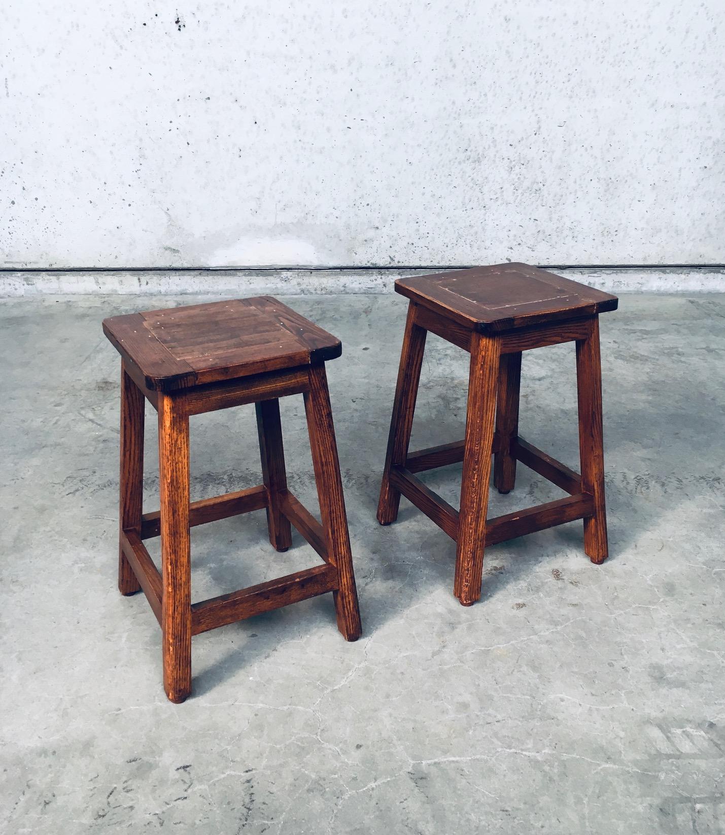 Vintage Square Wooden Potters Stool set of 2. Made in Belgium, 1950's. Solid beech wood constructed stools with original finish. Nice patina with minor wear. Both stools are in very good condition for their age and use. Each measures 53cm x 33cm x