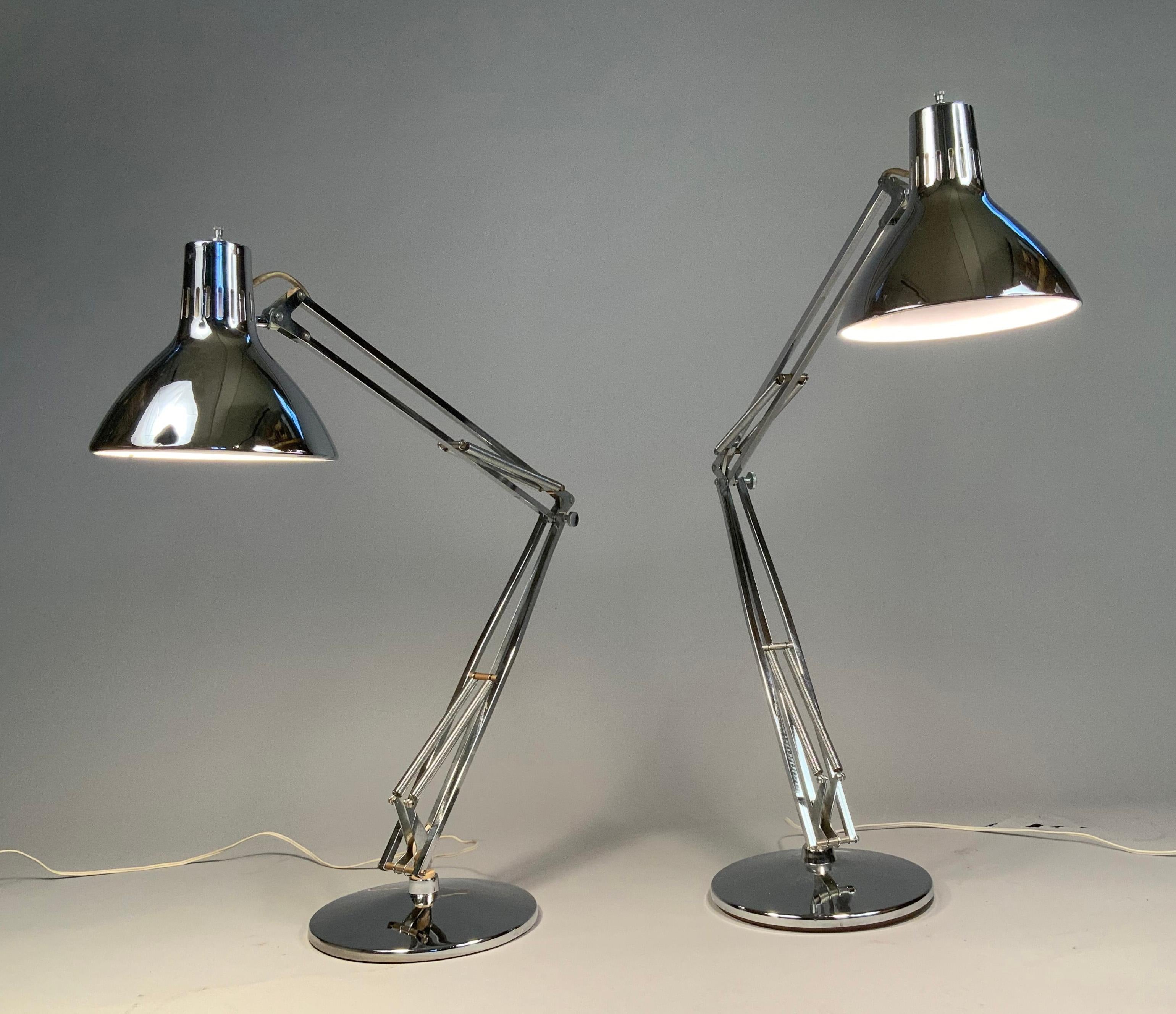 A very handsome matched pair of 1960's table lamps by Luxo. the L1 is the most famous and original self-balancing articulated table lamp. the most expensive version of this lamp is the one in polished chrome. 

The L1 lamp was designed by Jacob