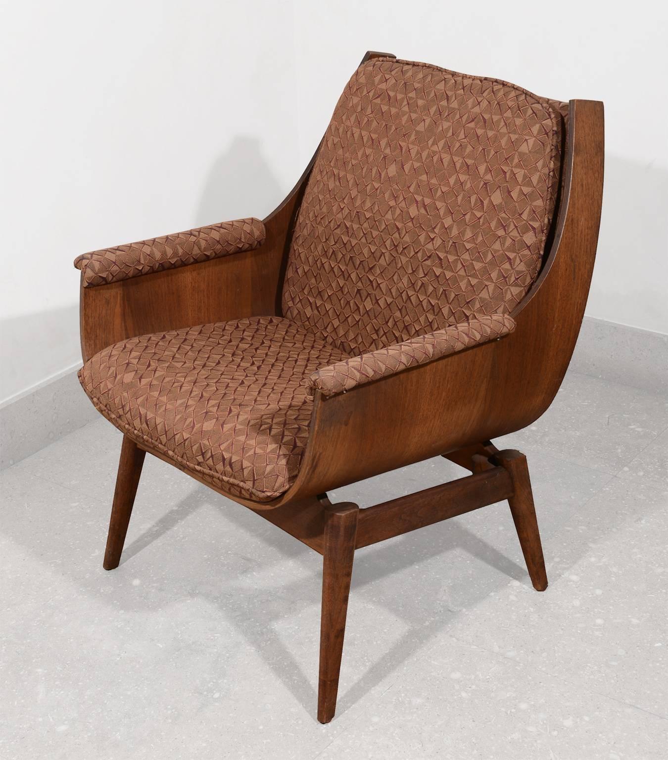 20th century formed wood armchair.