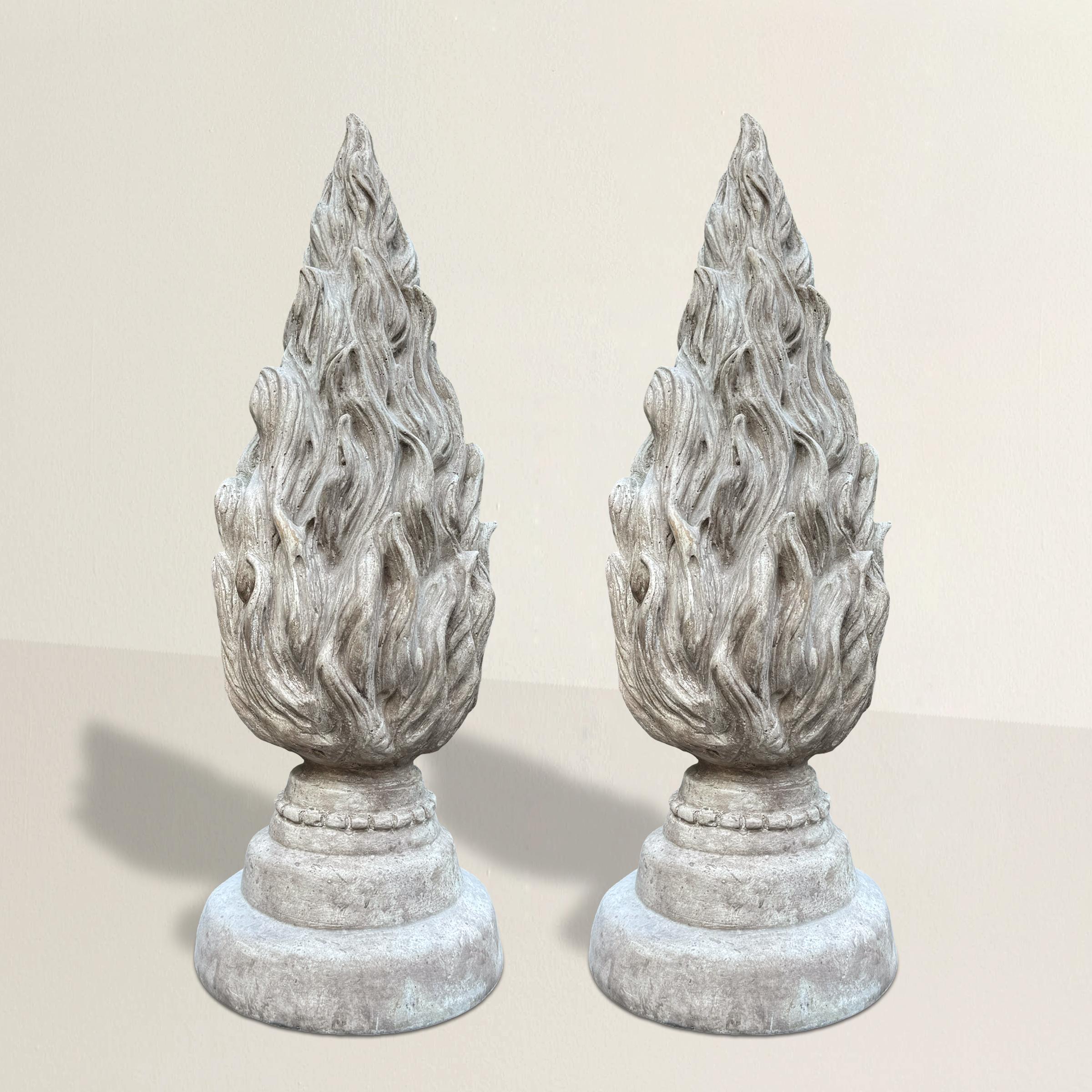 A pair of vintage 20th-century plaster flame finials, likely salvaged from a theater interior, now flicker with quiet symbolism. The flame—long a motif of inspiration, memory, and transformation—feels especially poignant in a theatrical context,