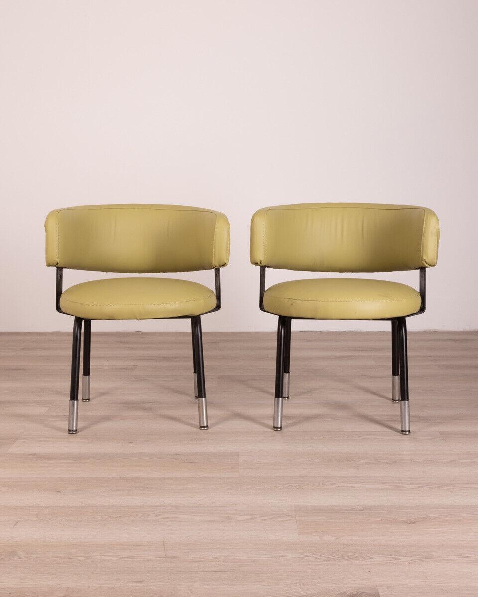 Pair of armchairs with black metal frame and chromed feet, green eco leather upholstery, 1970s.

Conditions: In good condition, they may show signs of wear due to time.

Dimensions: Height 71 cm; Width 60 cm; Length 52 cm

Materials: Metal and