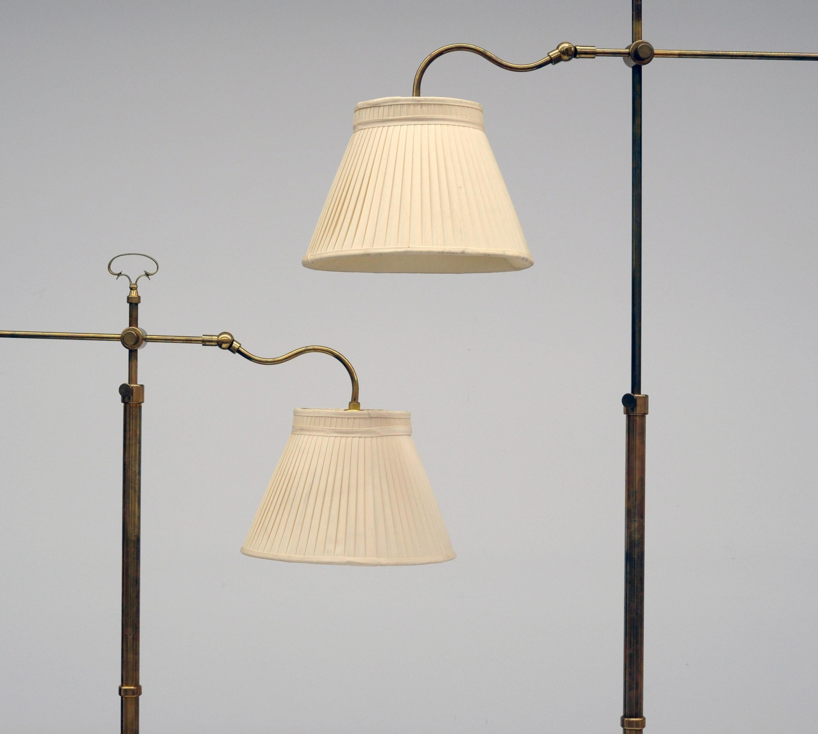 Unusual and appealing fully adjustable brass floor lamps. Clever designs allows for great versatility for directing light.