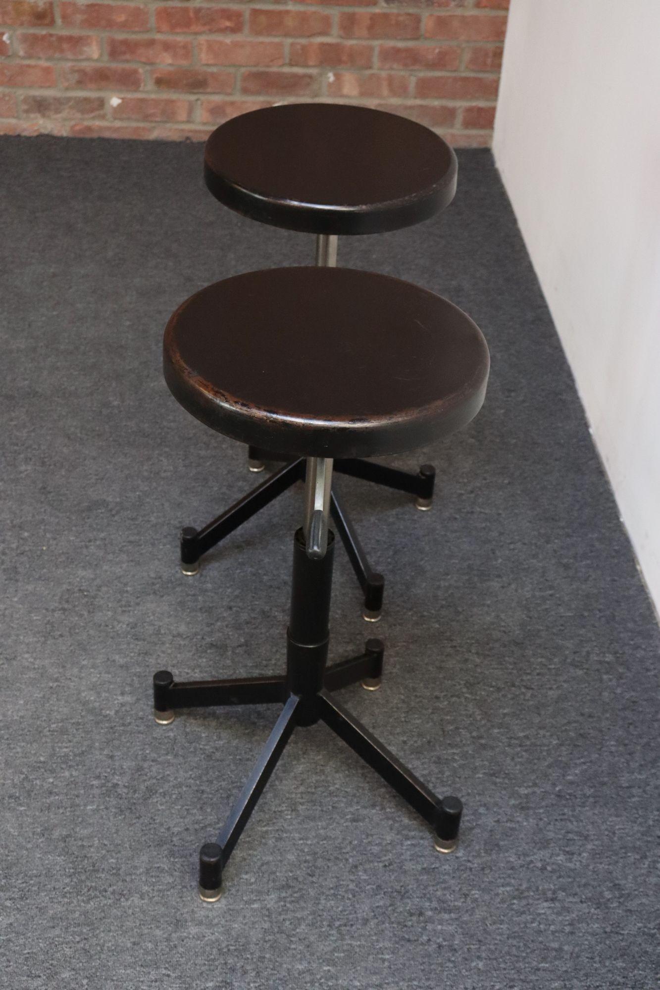 Pair of Industrial-style pneumatic posing or task stools by Photogenic Machine Company (ca. 1940s/50s, USA).
The Photogenic Machine Company of Youngstown Ohio has been producing photographic lighting equipment and accessories since 1903.
Though