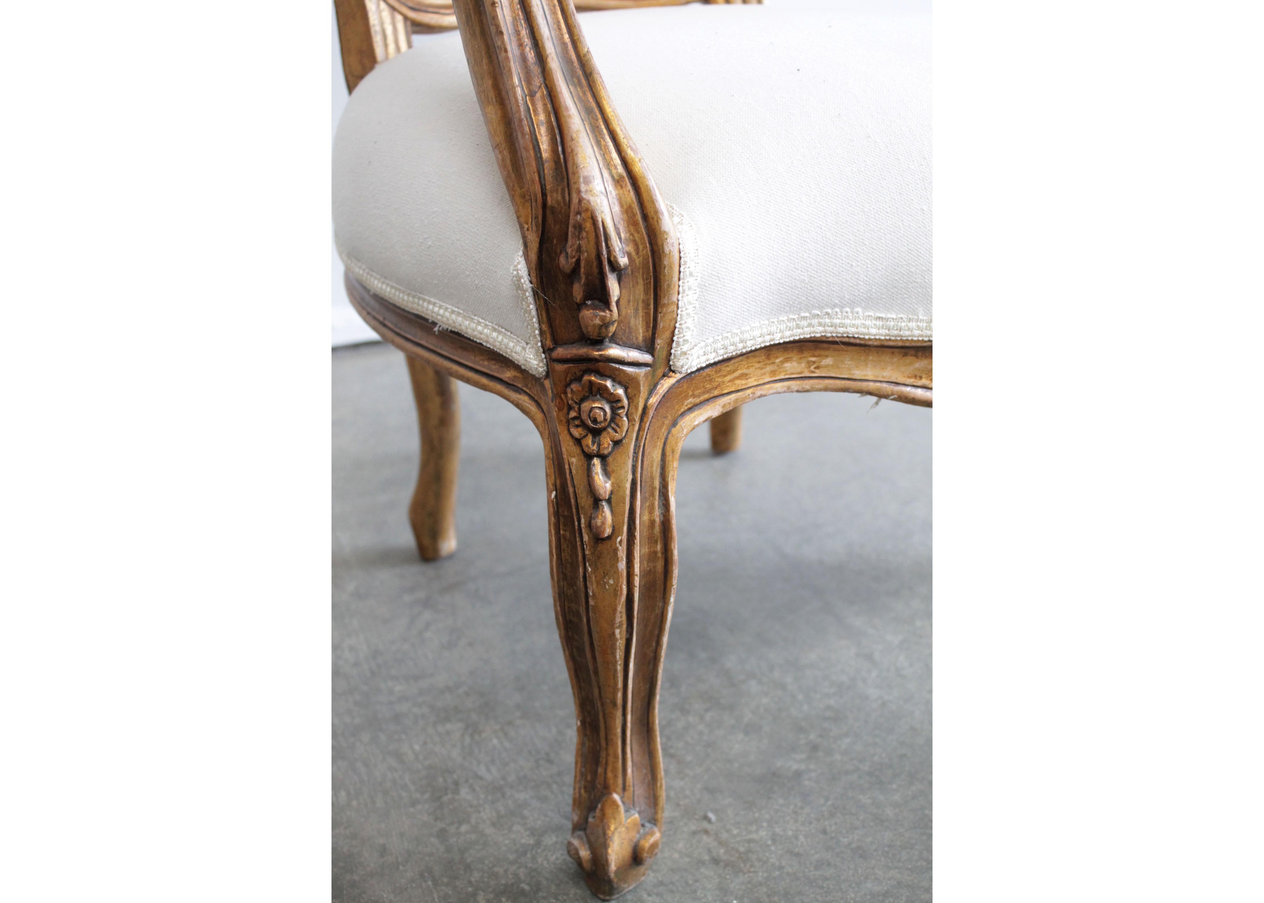 Pair of Vintage Aged Giltwood Louis XV Style Open Armchairs In Good Condition For Sale In Brea, CA