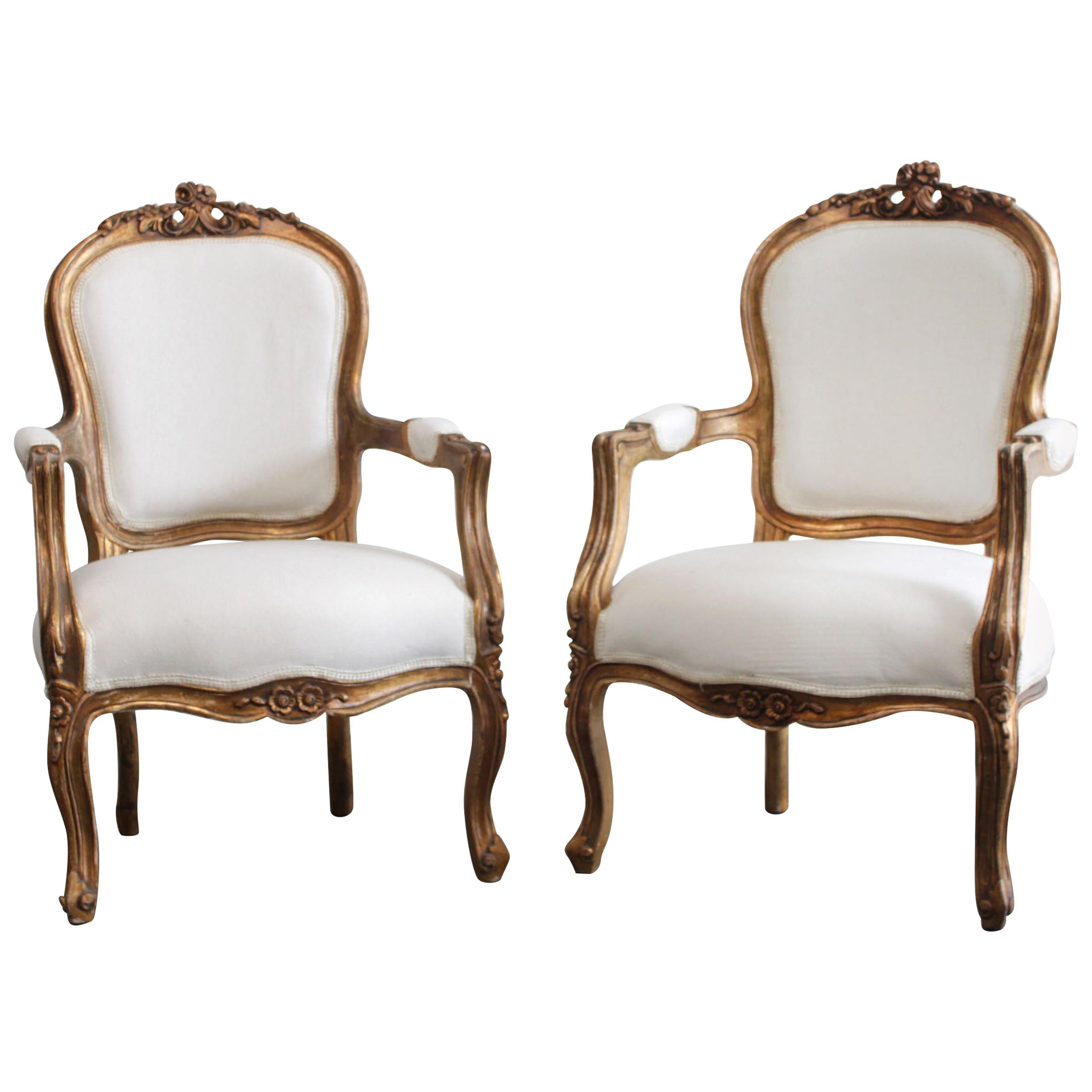 Pair of Vintage Aged Giltwood Louis XV Style Open Armchairs For Sale