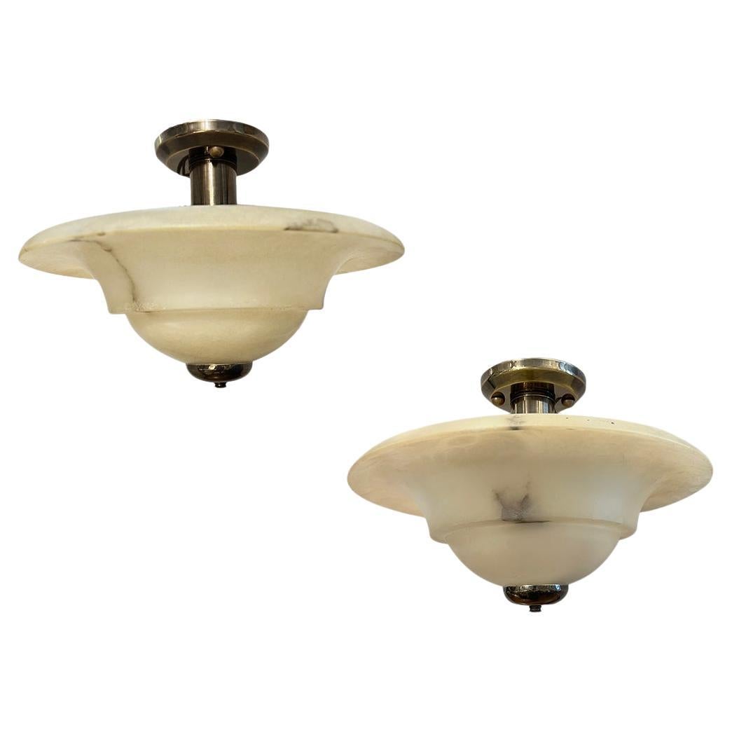 Pair of Vintage Alabaster light fixtures. Sold Individually