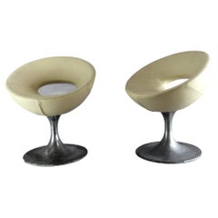 pair of Vintage aluminum cast leather eco chairs