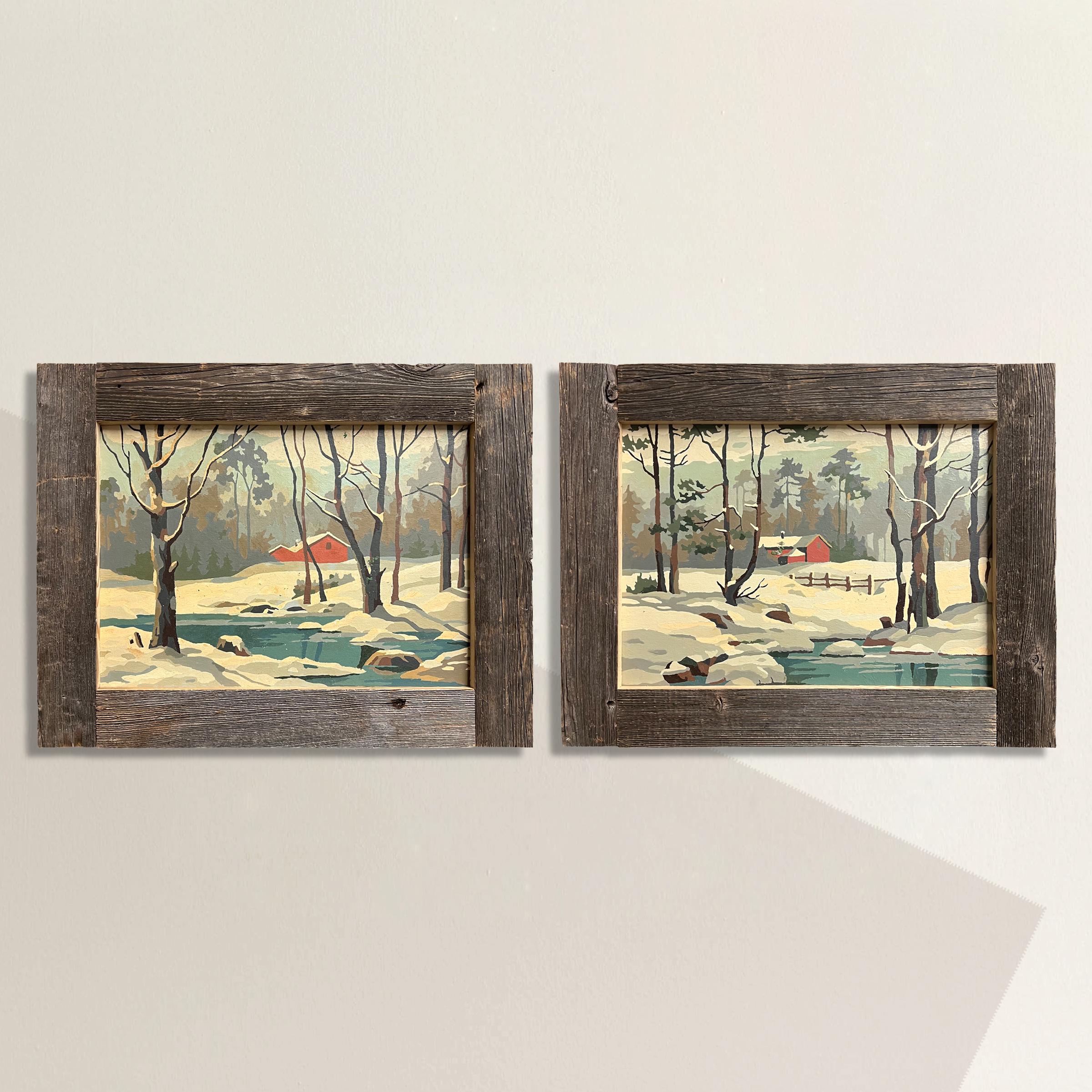Embark on a visual journey with this pair of mid-20th century American paint-by-number paintings, each capturing the serene beauty of a winter landscape. Each scene features a red barn nestled amid snow-covered surroundings, with a gentle creek in