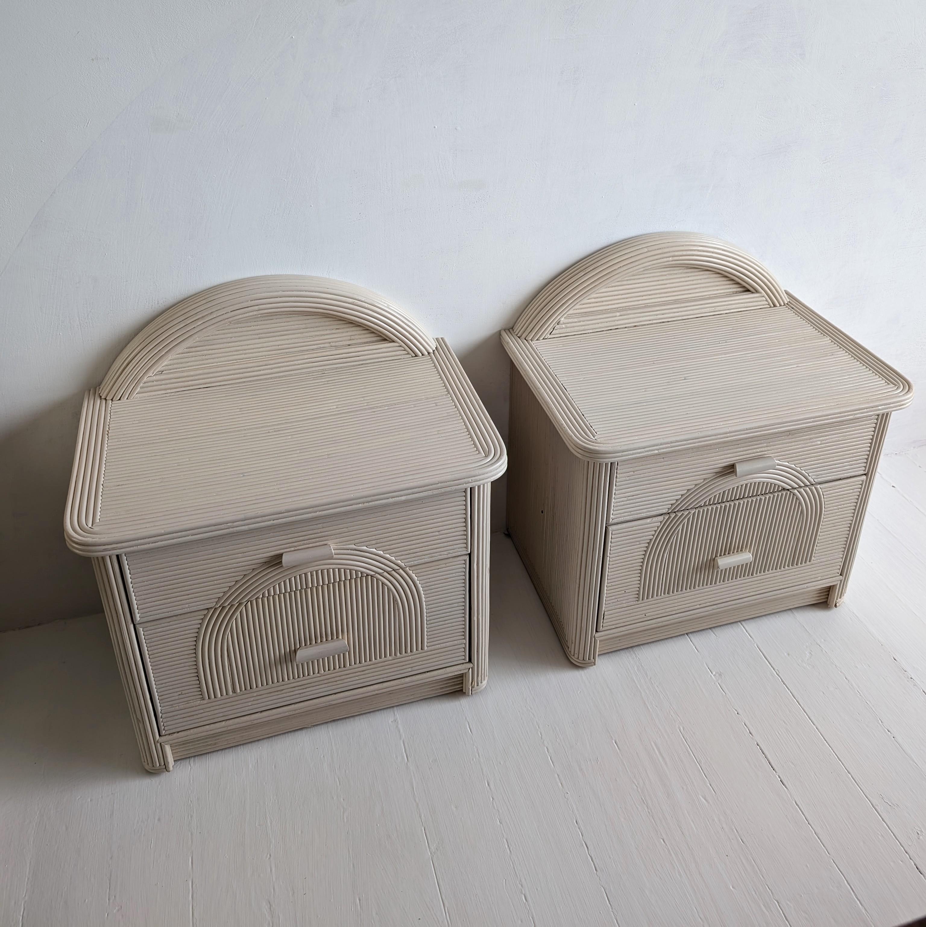 Bohemian Pair of vintage American pencil reed / cane bedside cabinets with arched backs