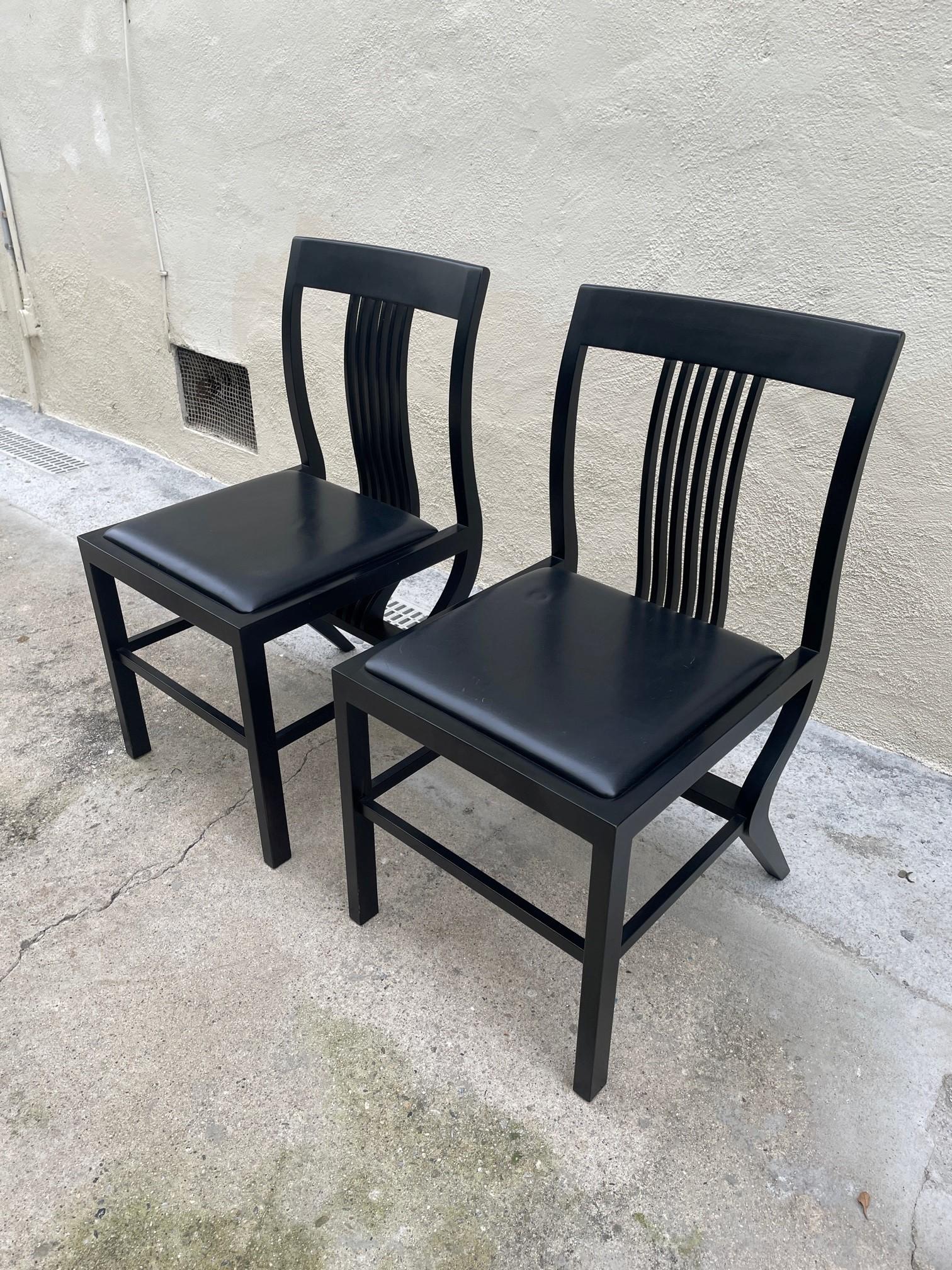 Beautiful pair of vintage 'Monroe' chairs designed by Arata Isozaki for Tendo, Japan c. 1980s. This pair/example was produced into 1985, in great condition with no significant damage/wear to frame.
Frame is in ebonized Cherrywood; sculptural in its
