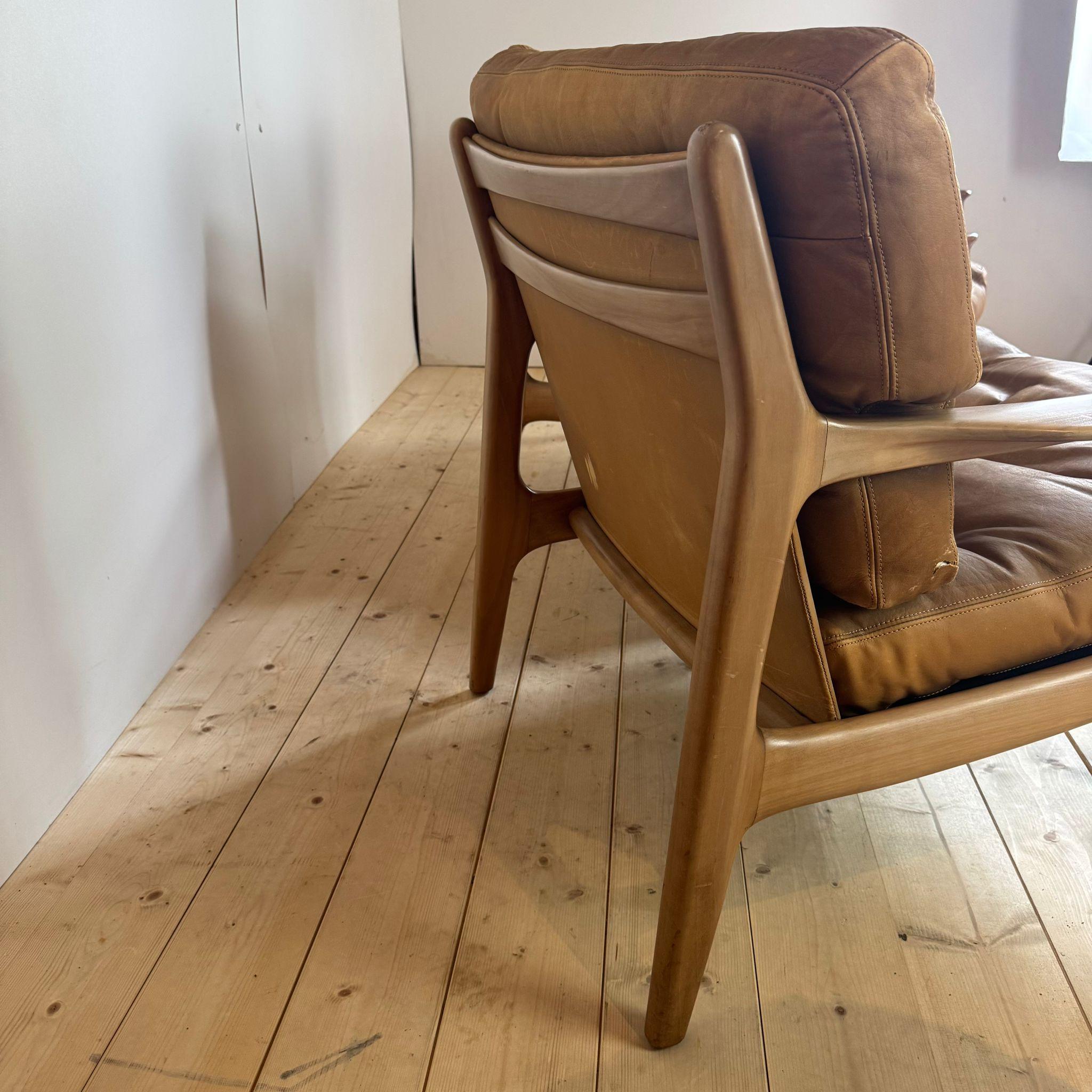 Paire de fauteuils vintage en cuir
