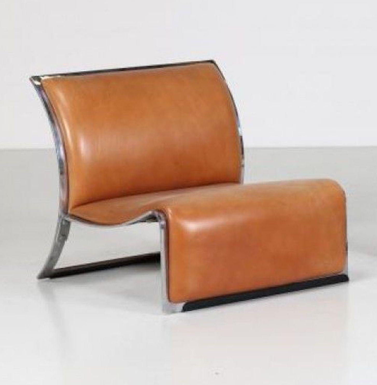 Pair of Vintage Italian armchairs in chromed metal and leather designed by Vittorio Introini in the 1960s for Saporti Italia 1965.

Very Good conditions.
