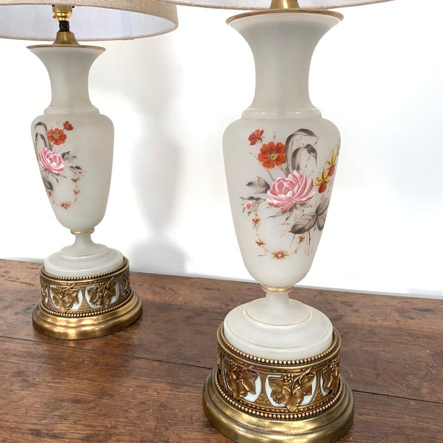 Very decorative pair of Art Nouveau hand painted and gilded frosted glass lamps with brass galleried bases.
Lovely condition to both lamps with just some age marks (which I am attempting to remove) and both the painting and the gilding has aged
