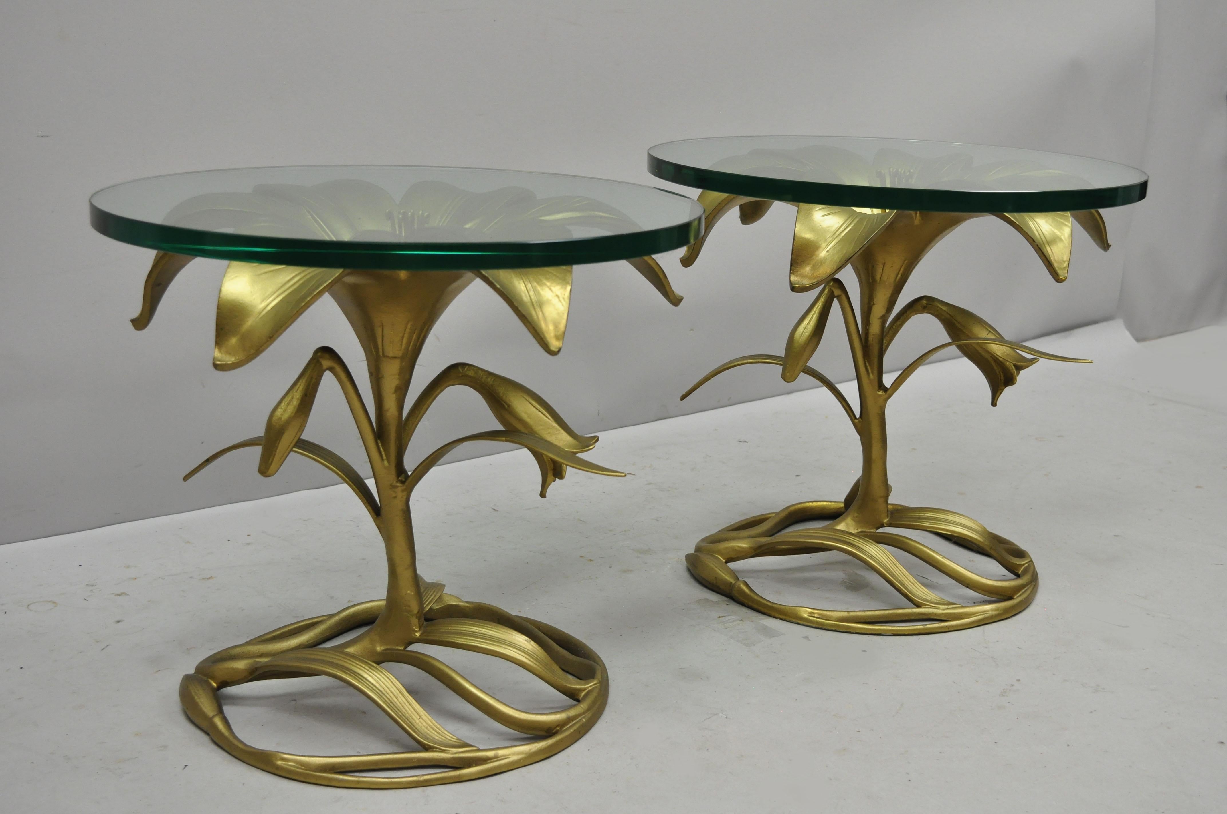 Pair of vintage Arthur court gold lily flower glass top side tables. Item features cast metal base, 0.75