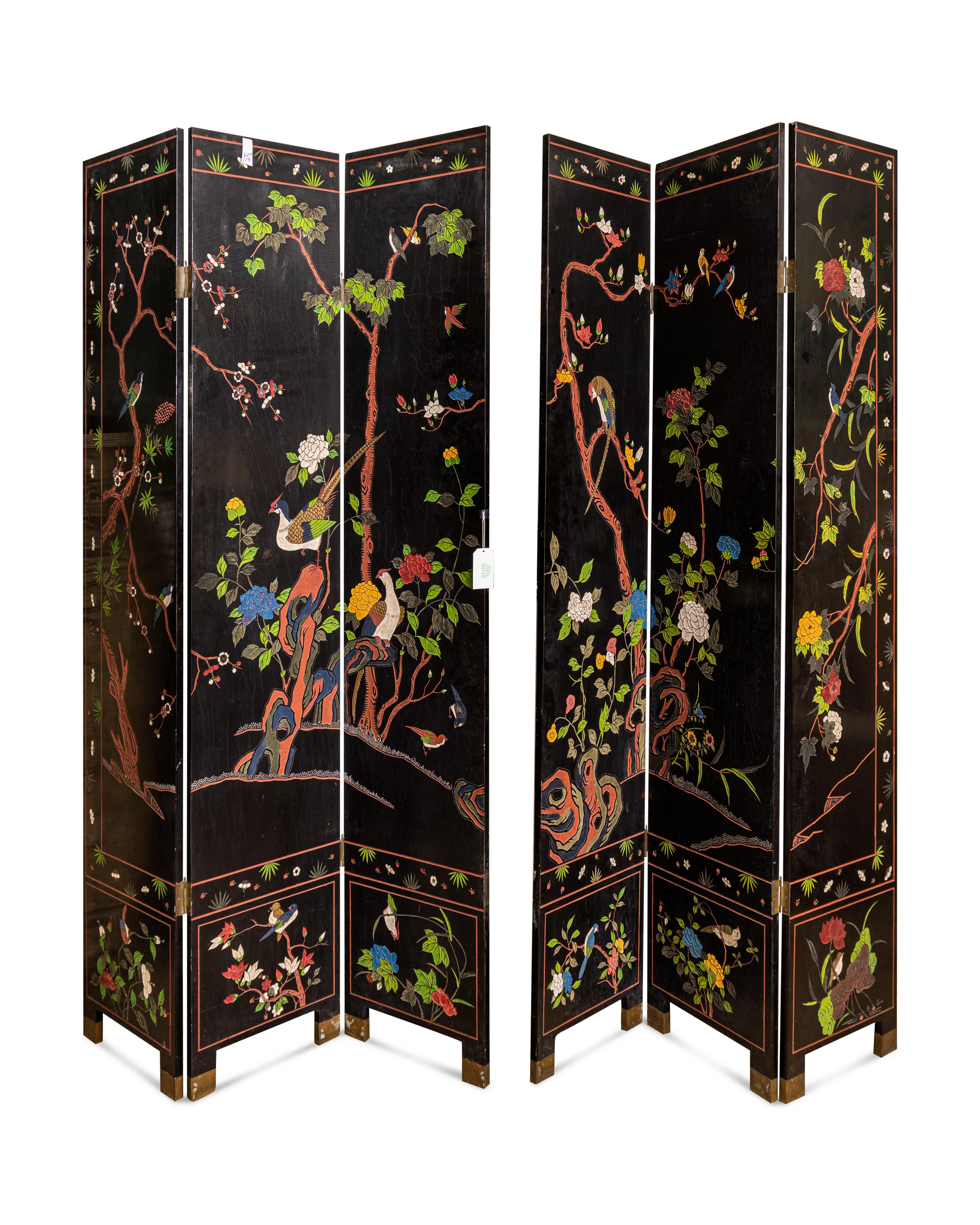 Super Chic pair of vintage Asian 3 Panel black lacquered screens with beautiful carved intricate detail and hand painted. Each side is displaying a different scene, one side is beautiful birds surrounded by flowers and a Tagai forest. The other side