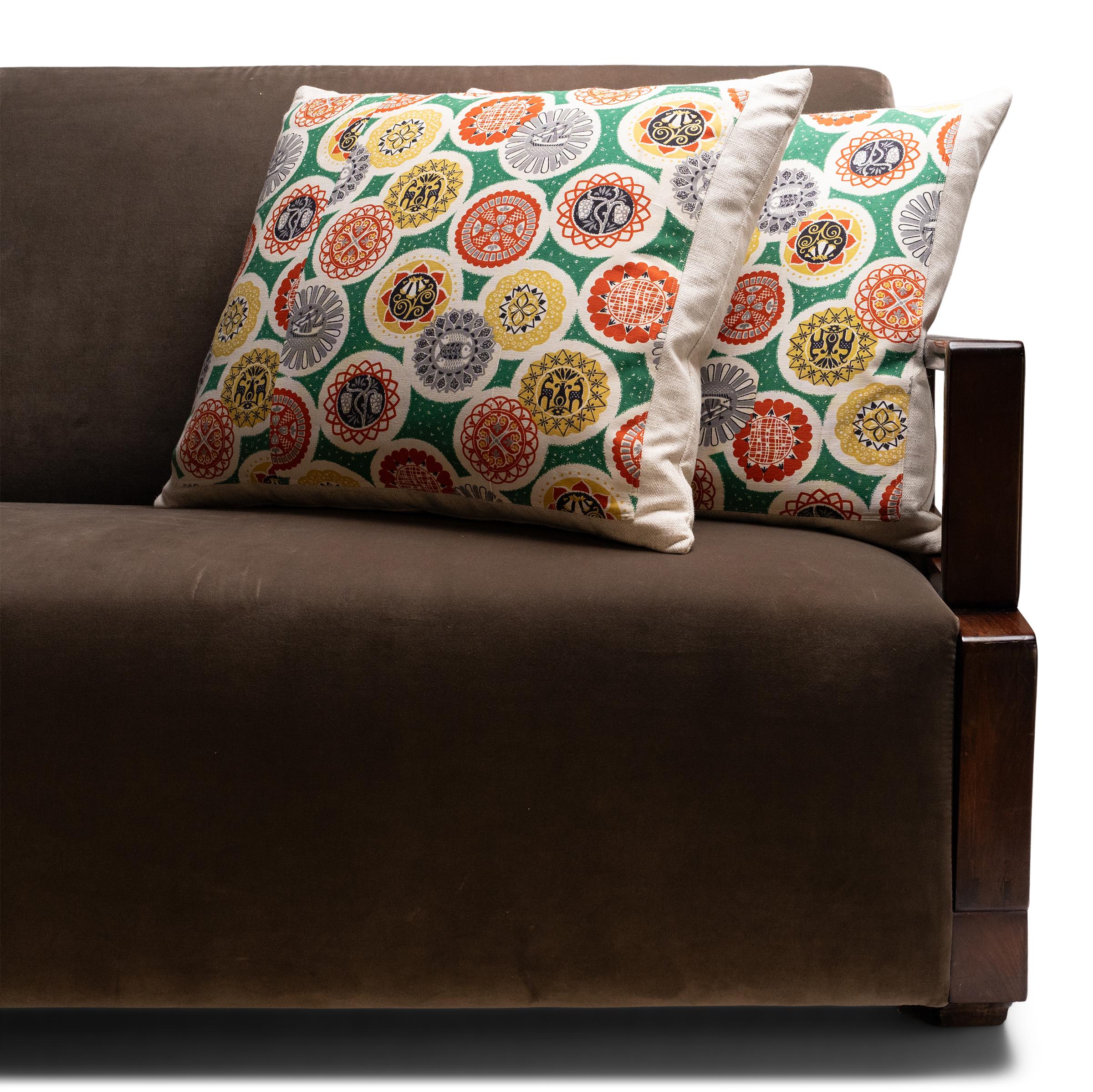 These hand-crafted pillows were designed by a local Chicago artist and textile historian who lovingly repurposes the vintage fabrics, garments and embroidery fragments she collects during her travels. Down-filled and backed with herringbone white