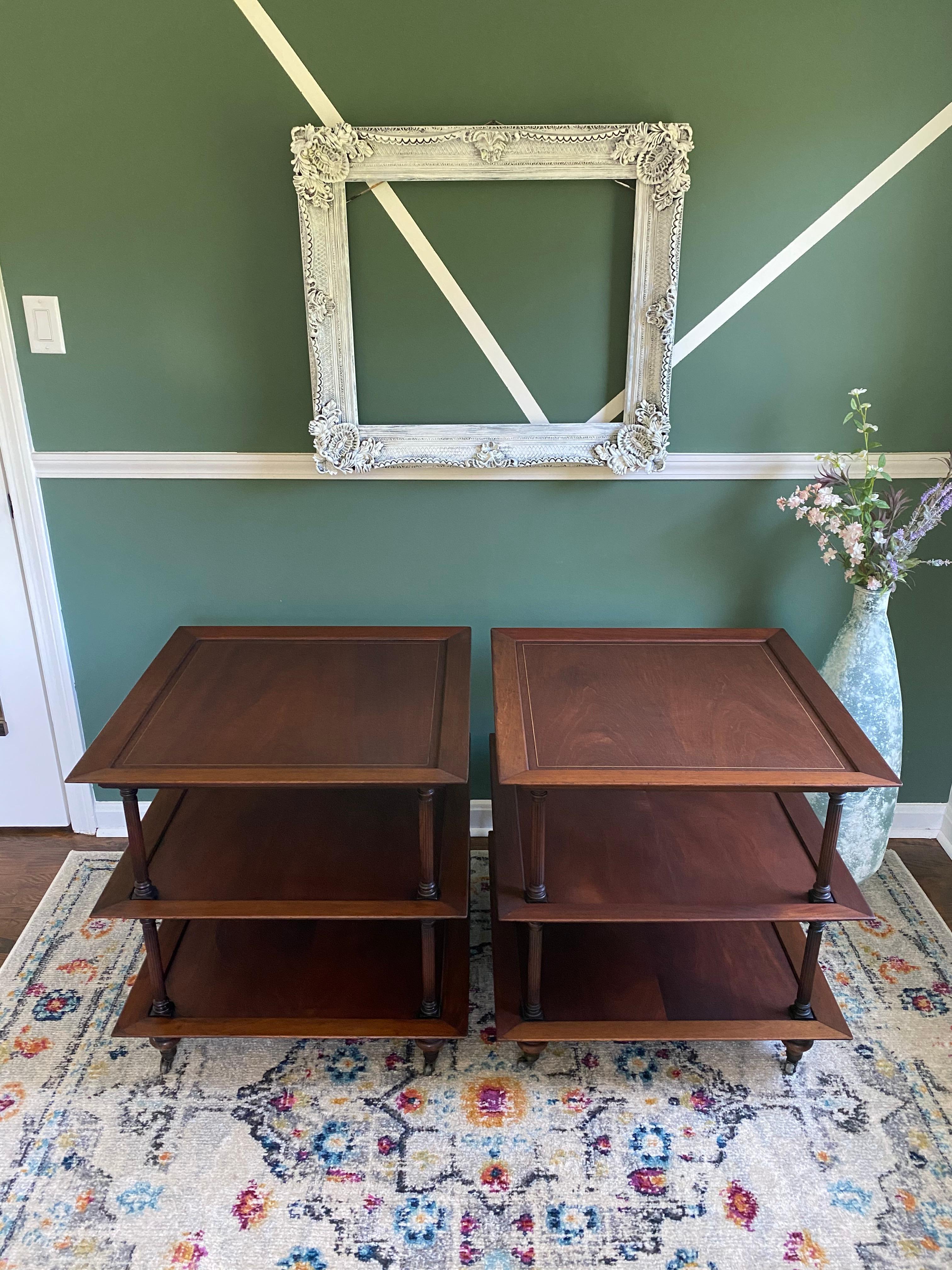 Beautiful refinished pair of Baker Furniture style 3-tier side tables on casters. No other pair on the market right now! Perfect to add to your home!