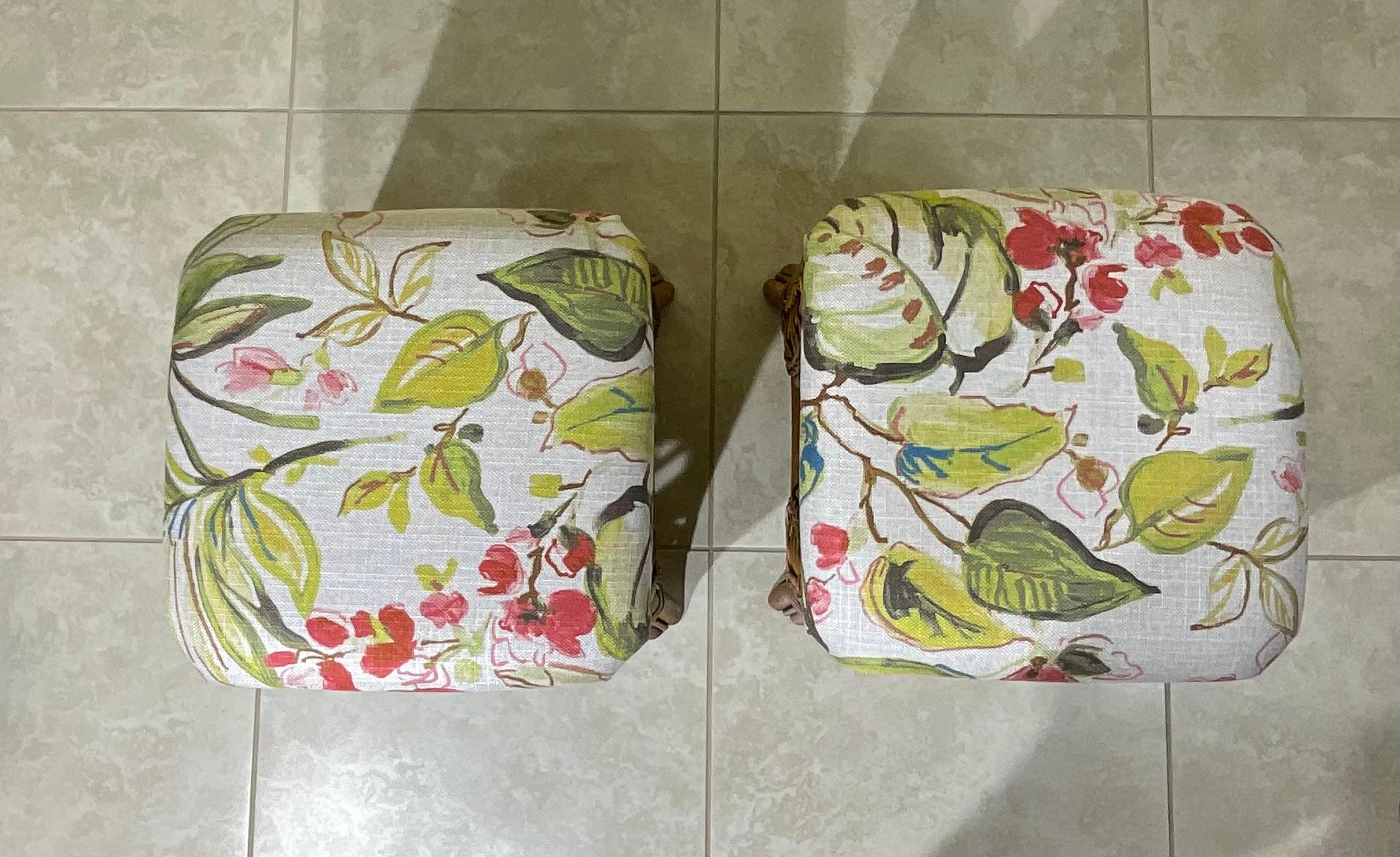 Decorative pair of vintage bamboo and rattan stools or benches ,newly upholstered with fine floral print fabric .
Great addition to any room.