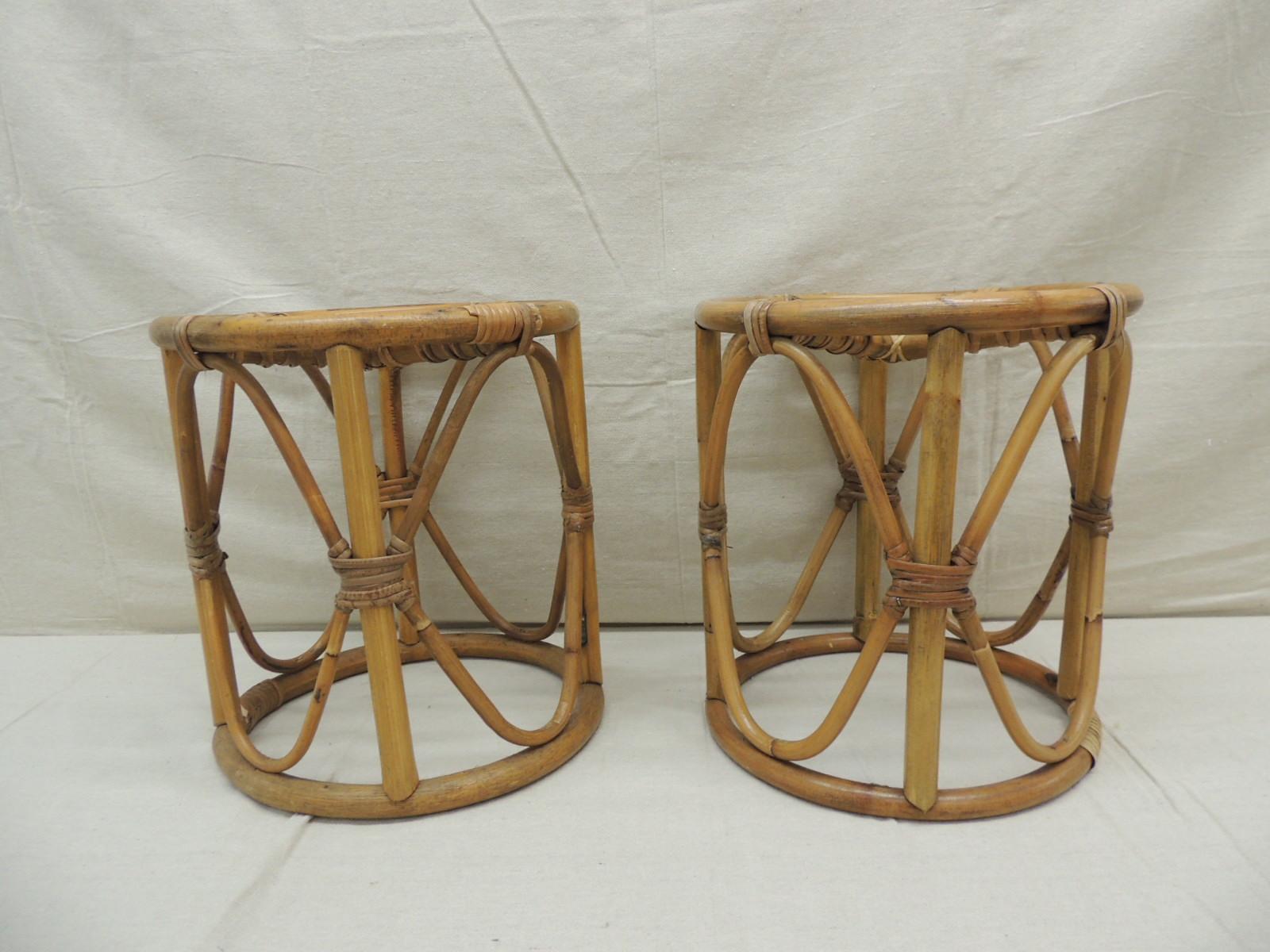 Pair of vintage bamboo and rattan round stools or side tables.
Size: 12” D x 13.5” H.