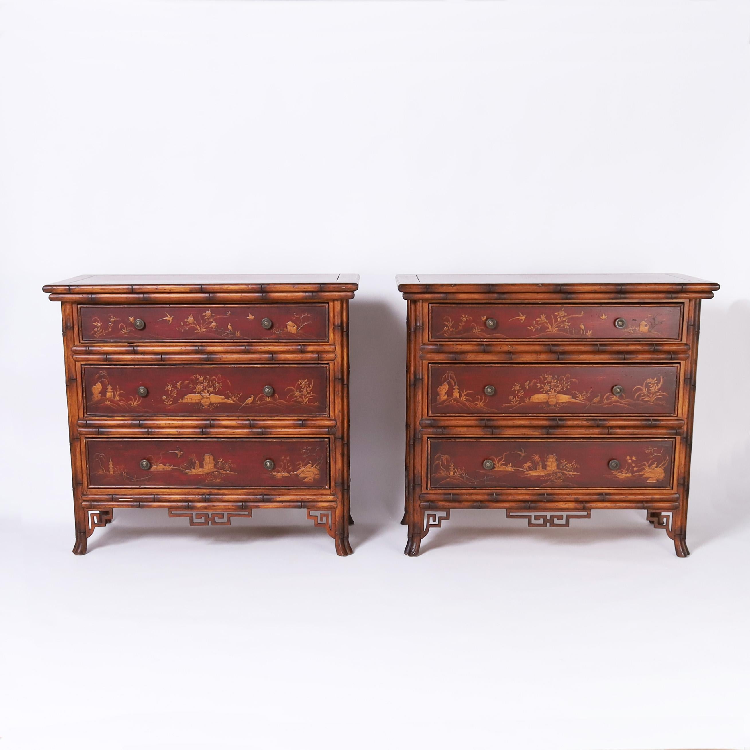Impressive pair of mid century three drawer chests crafted with bamboo frames, featuring red lacquer panels decorated in Chinoiserie, brass hardware, Asian style brackets and splayed feet. Attributed to Maitland-Smith.