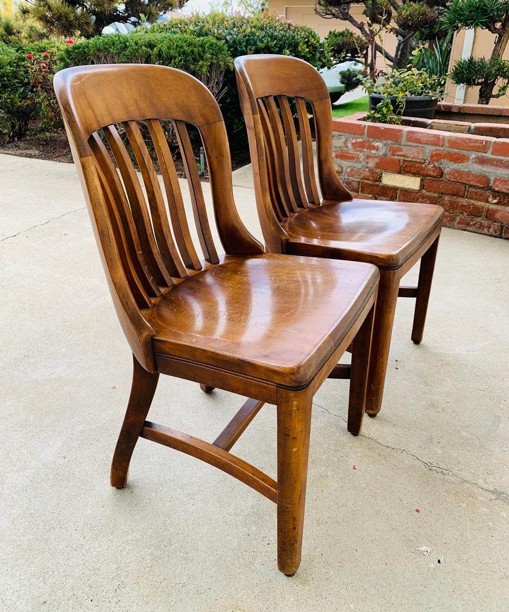 Vintage bankers chair courtroom chair Sykes Co Inc Buffalo, NY

These are solid wood bankers chairs. This bankers chairs were manufactured by Sykes Co., Inc., Buffalo New York; the mark is on the back side of the chairs. These chairs were used in