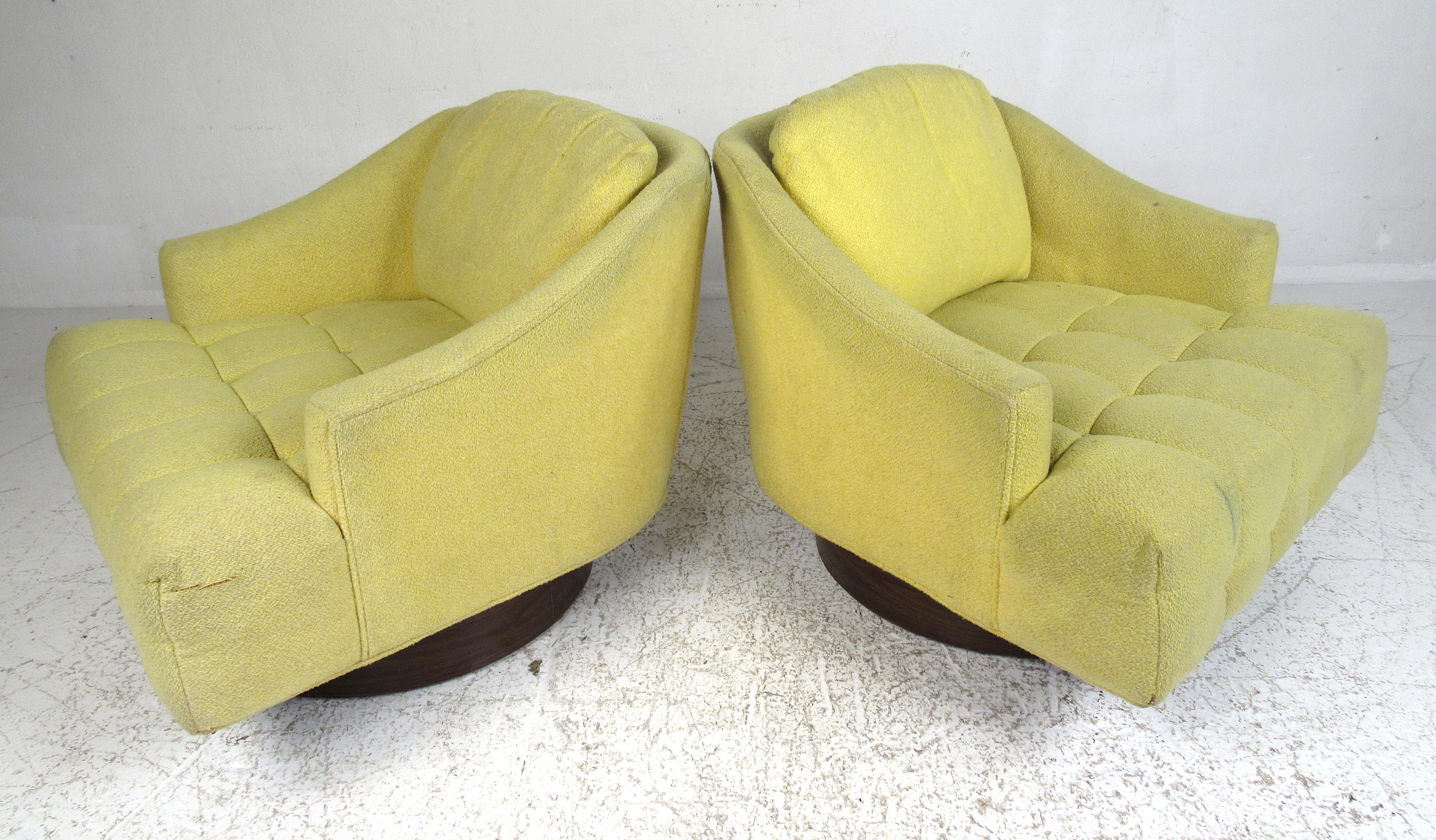 Mid-Century Modern barrel back swivel chairs in the style of Thayer Coggin. Please confirm item location (NY or NJ) with dealer.

  