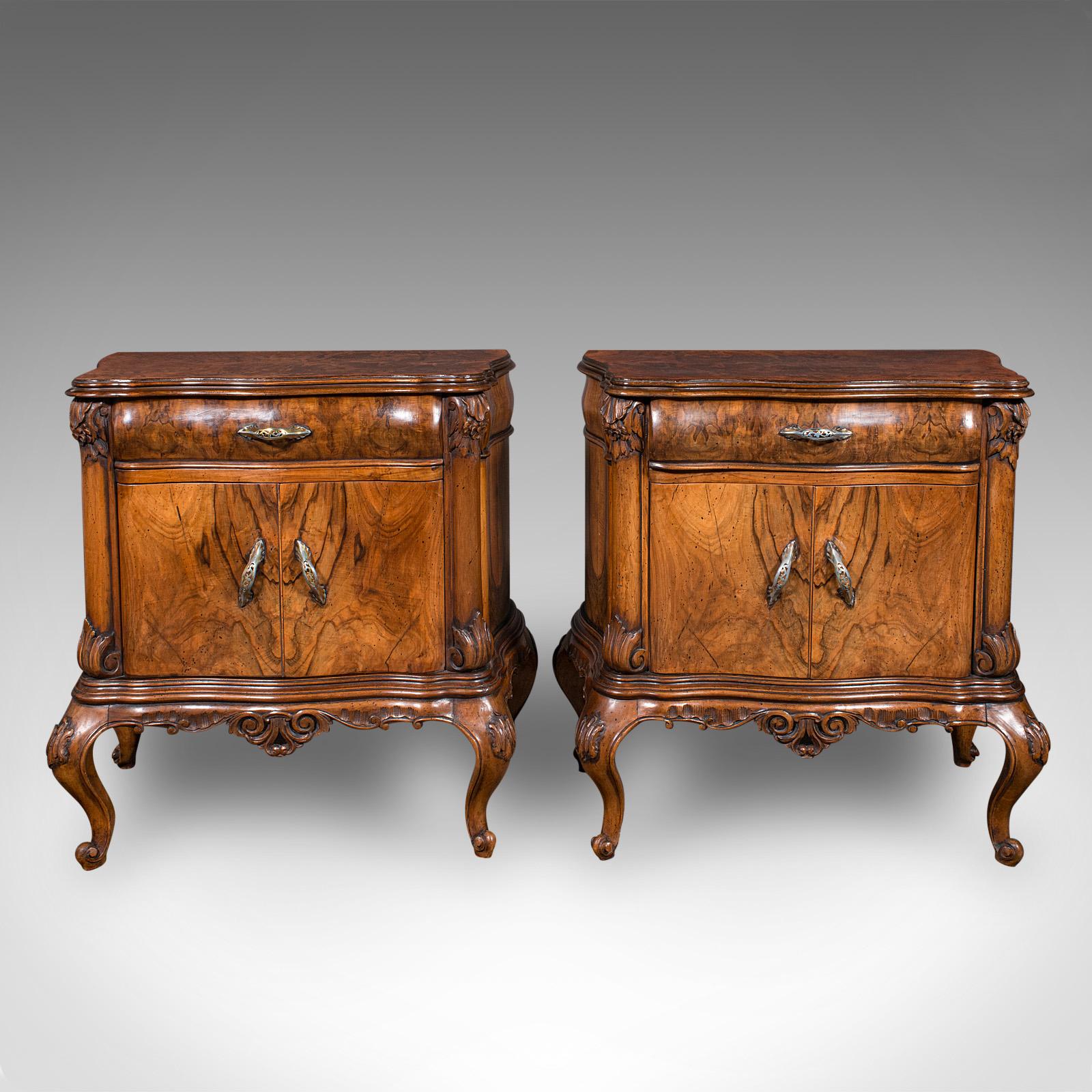 
This is a pair of vintage bedside cabinets. An Italian, burr walnut bedroom nightstand in Rococo taste, dating to the late 20th century, circa 1970.

Fine late 20th century cabinetry, with striking Rococo influence
Displaying a desirable aged