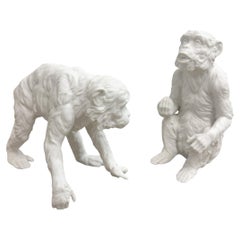 Coppia di scimmie macaco in porcellana di Bisque d'epoca