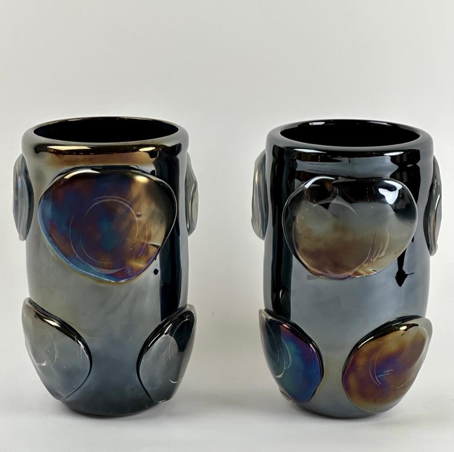 Late 20th century pair of black iridescent Murano art glass vases with round Murano glass black applications.
Hand signed on the bottom.