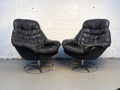 Pair of Vintage Black Leather Swivel Chairs
