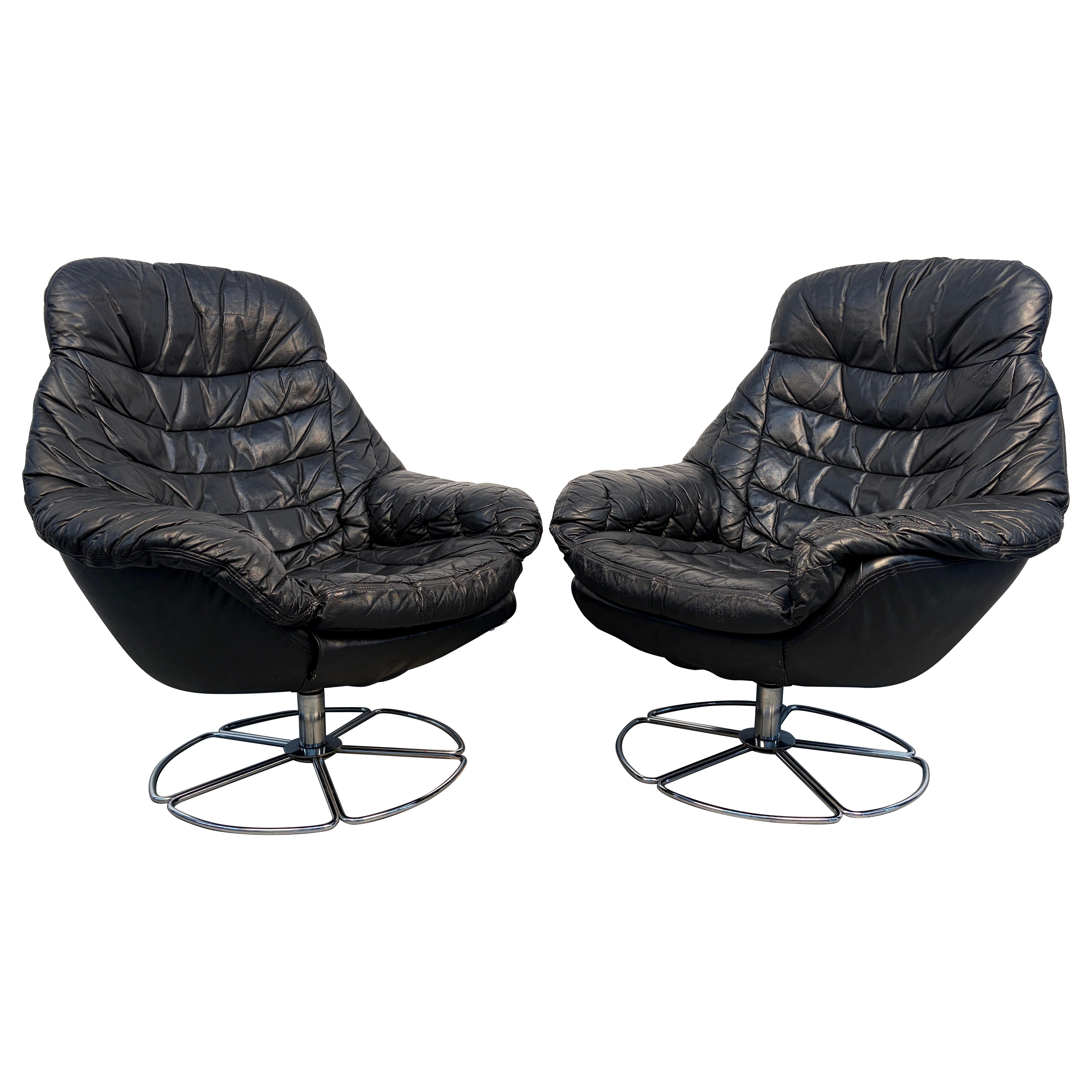 Pair of Vintage Black Leather Swivel Chairs For Sale