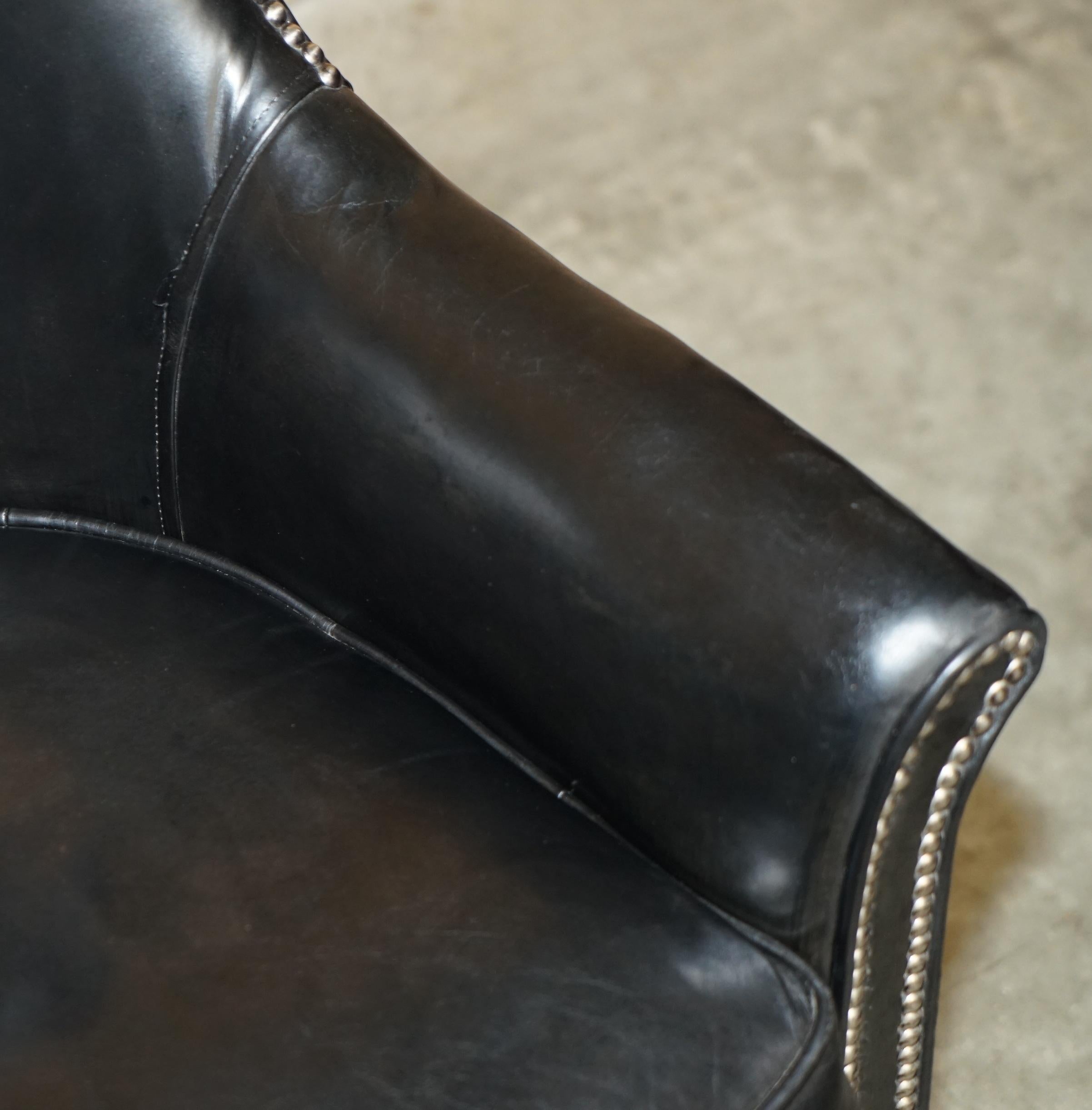 Leather PAIR OF VINTAGE BLACK LEATHER TUB CLUB ARMCHAIRS WiTH HAND STUDDED UPHOLSTERY For Sale