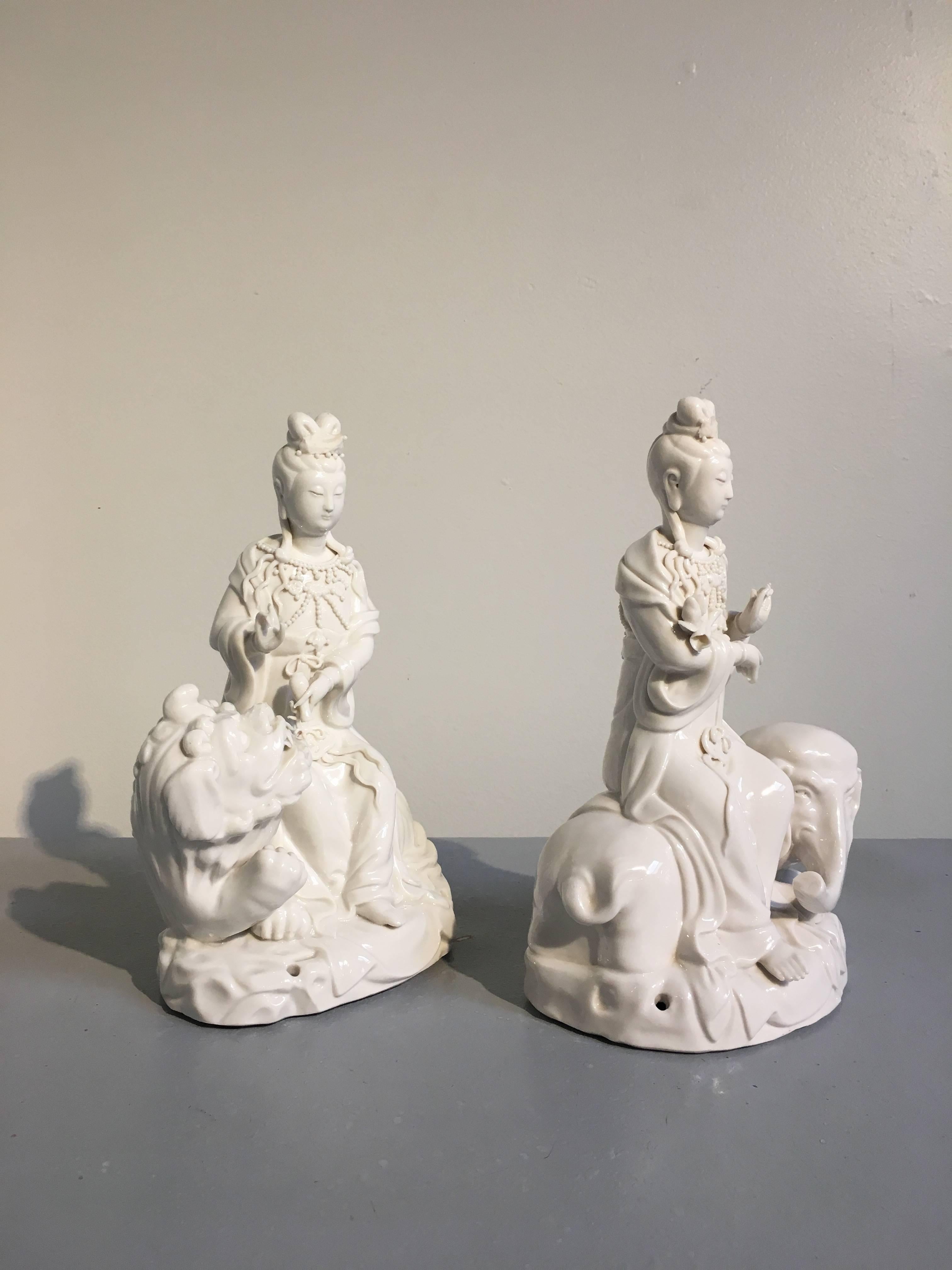 Glazed Pair of Vintage Blanc de Chine Figures of Guanyin Riding an Elephant and Lion For Sale