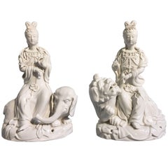 Pair of Vintage Blanc de Chine Figures of Guanyin Riding an Elephant and Lion