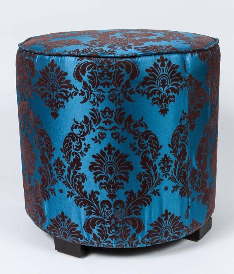 Pair of Art Deco Style round Moroccan stool in blue and brown fabric upholstery in 1970s style. 
Moroccan Art Deco Style little pouf hassock, upholstered footstool or modern circular ottoman. 
This versatile accent piece, pouf is designed primarily