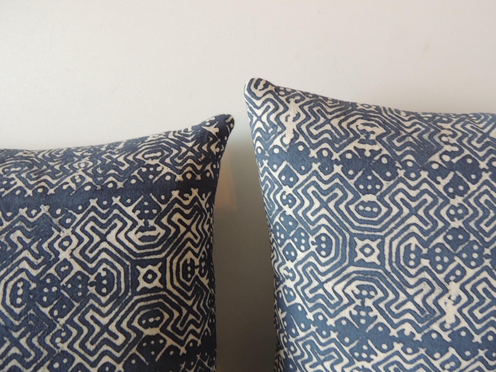 Pair of vintage blue and white petite hand-blocked batik decorative pillows.
Soft blue linen backings.
Decorative pillow handcrafted and designed in the USA. 
Closure by stitch (no zipper closure) with custom made pillow insert.
Size: 11' H x
