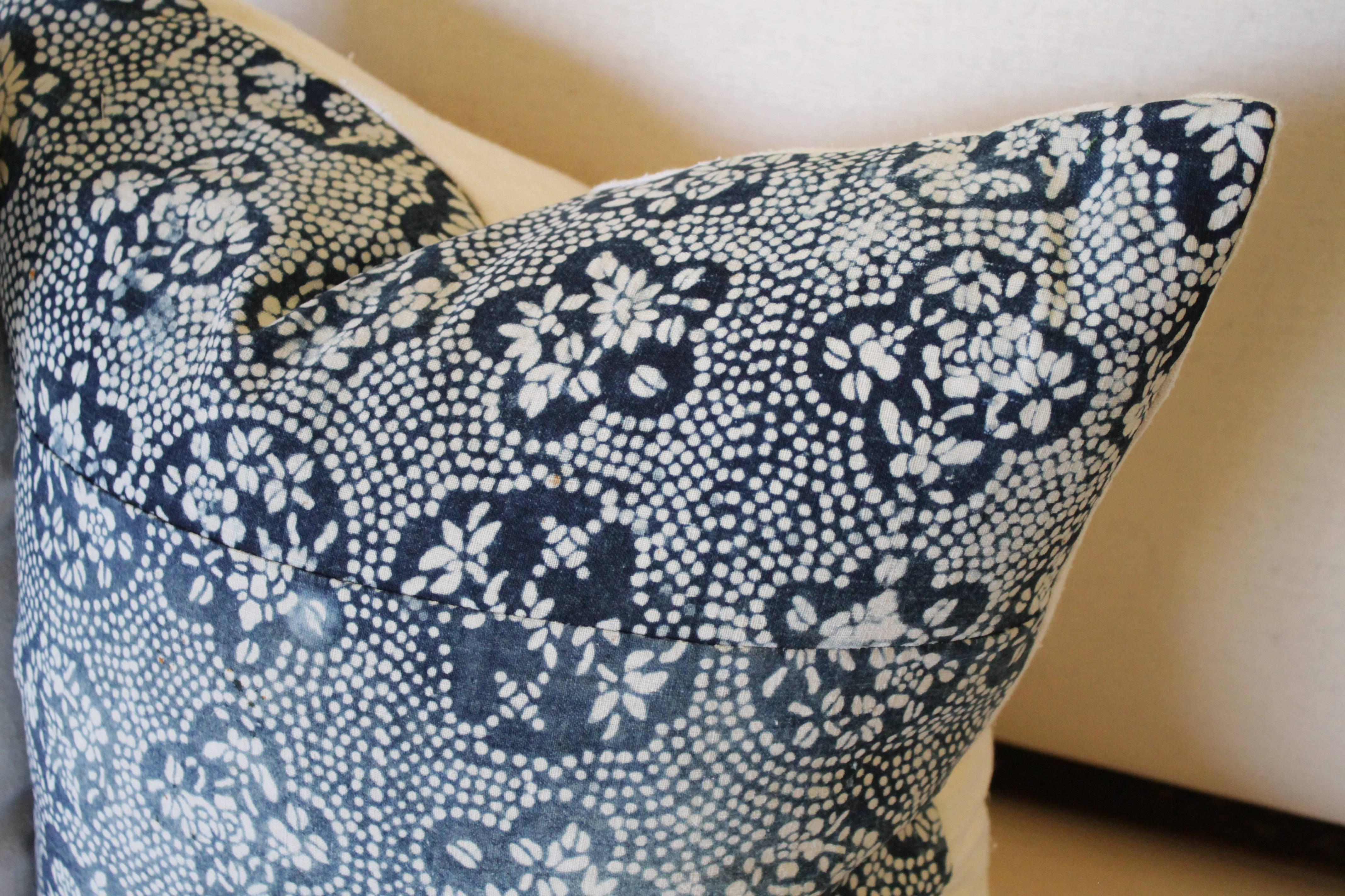 Beautiful vintage and antique Japanese Indigo floral and dot printed pillow. Cotton printed front is beautifully faded, creating a multi toned indigo pattern on the front. Backed in an antique French natural linen and hidden zipper closure.