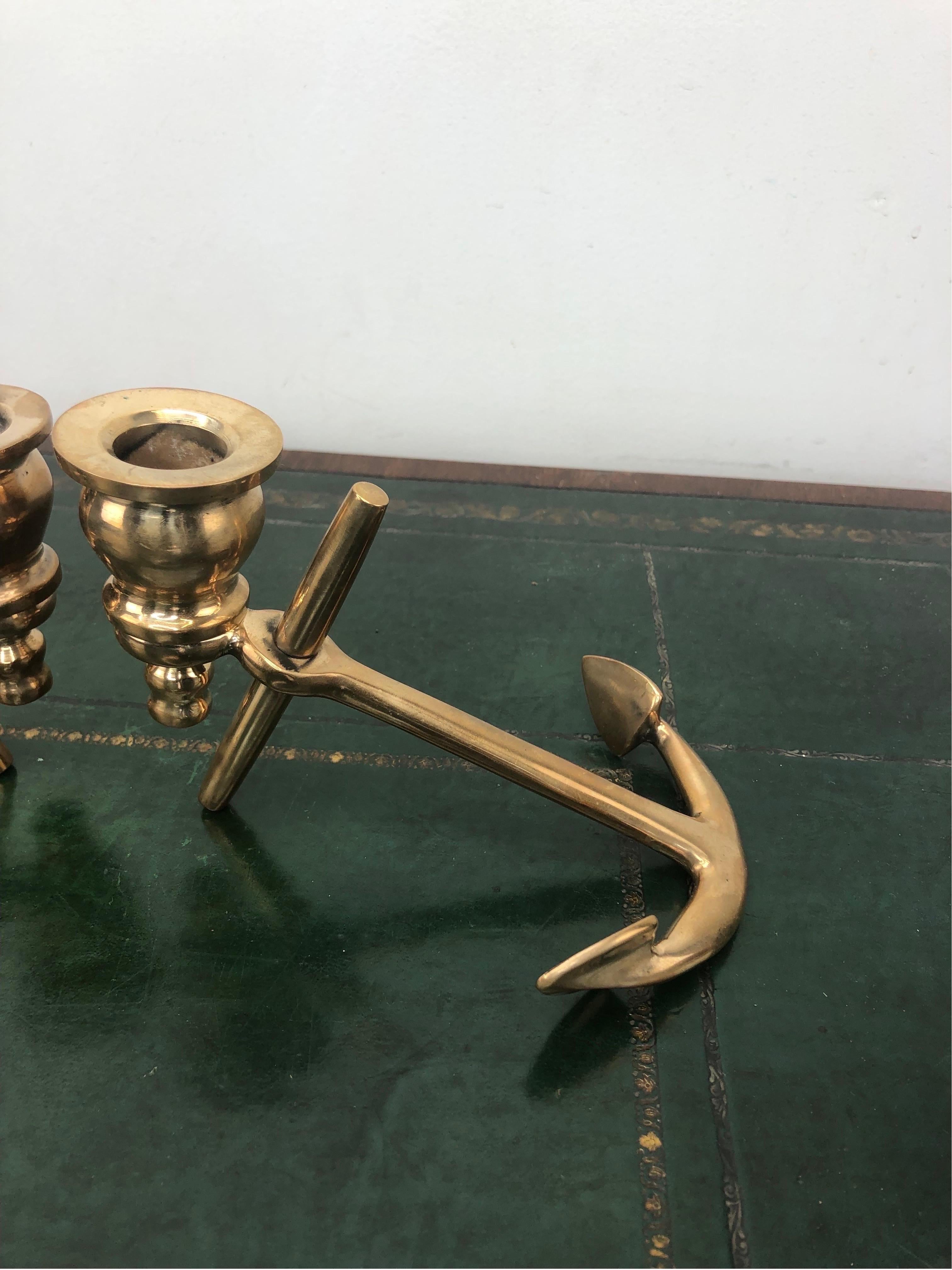Pair of Vintage Brass Anchor Nautical Candlesticks. Made of marine brass, which has a higher copper giving the candlesticks a rosier appearance. These have been polished and will retain their shine for a long time. 